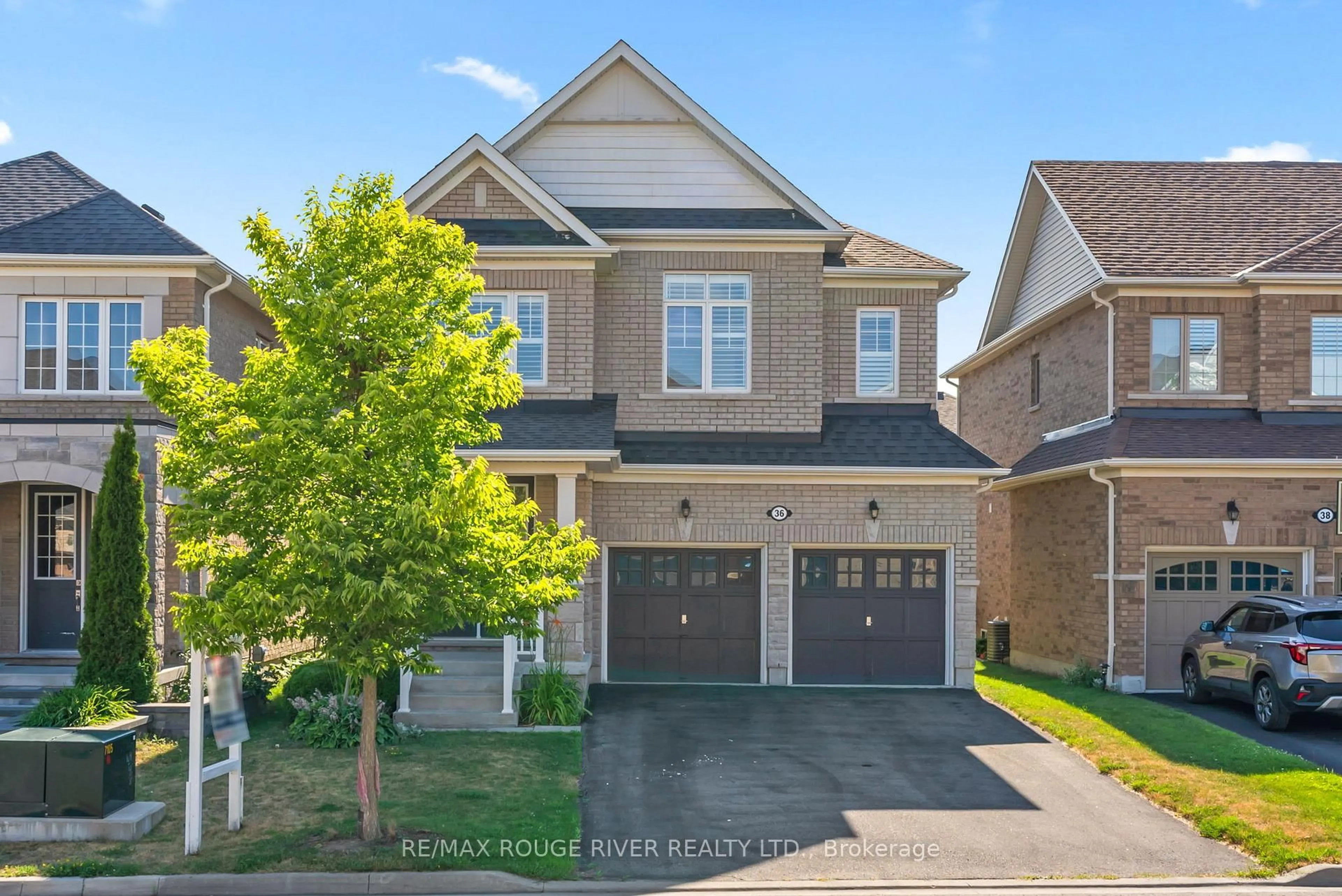 Home with brick exterior material, street for 36 Charterhouse Dr, Whitby Ontario L1R 3R8