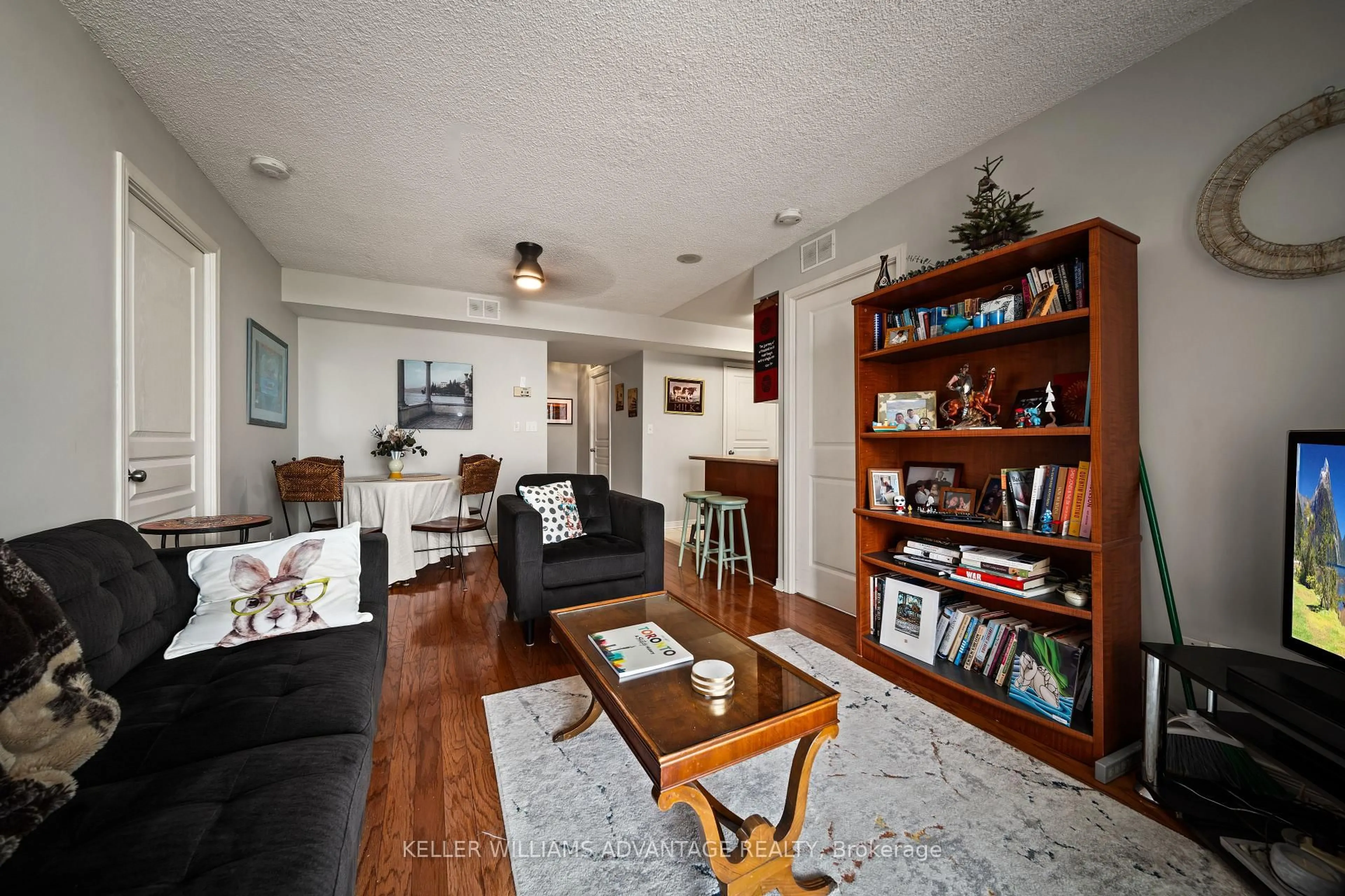 Living room with furniture, unknown for 1765 Queen St #402, Toronto Ontario M4L 3Z2