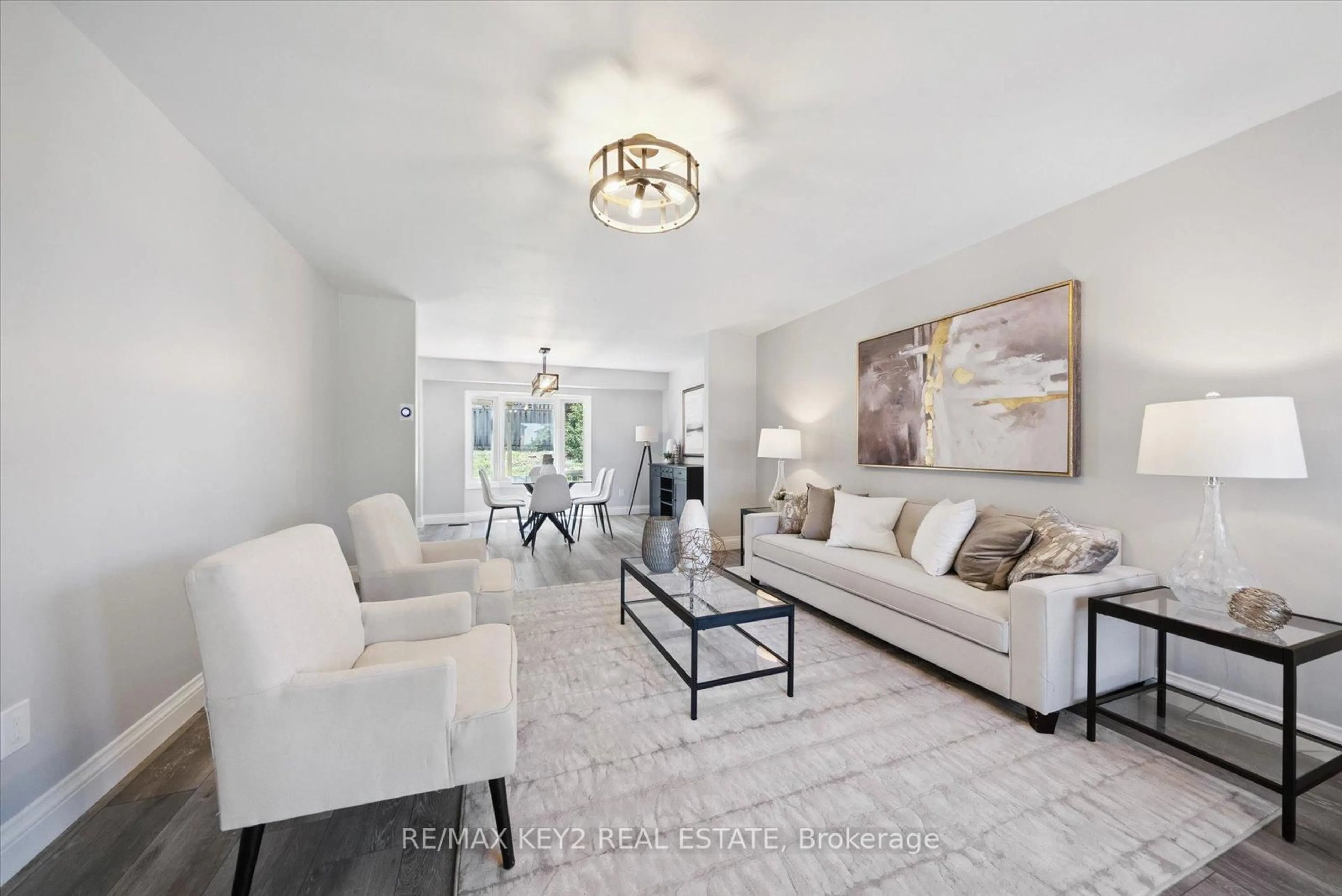 Living room with furniture, ceramic/tile floor for 2284 Chapman Crt, Pickering Ontario L1X 2E8
