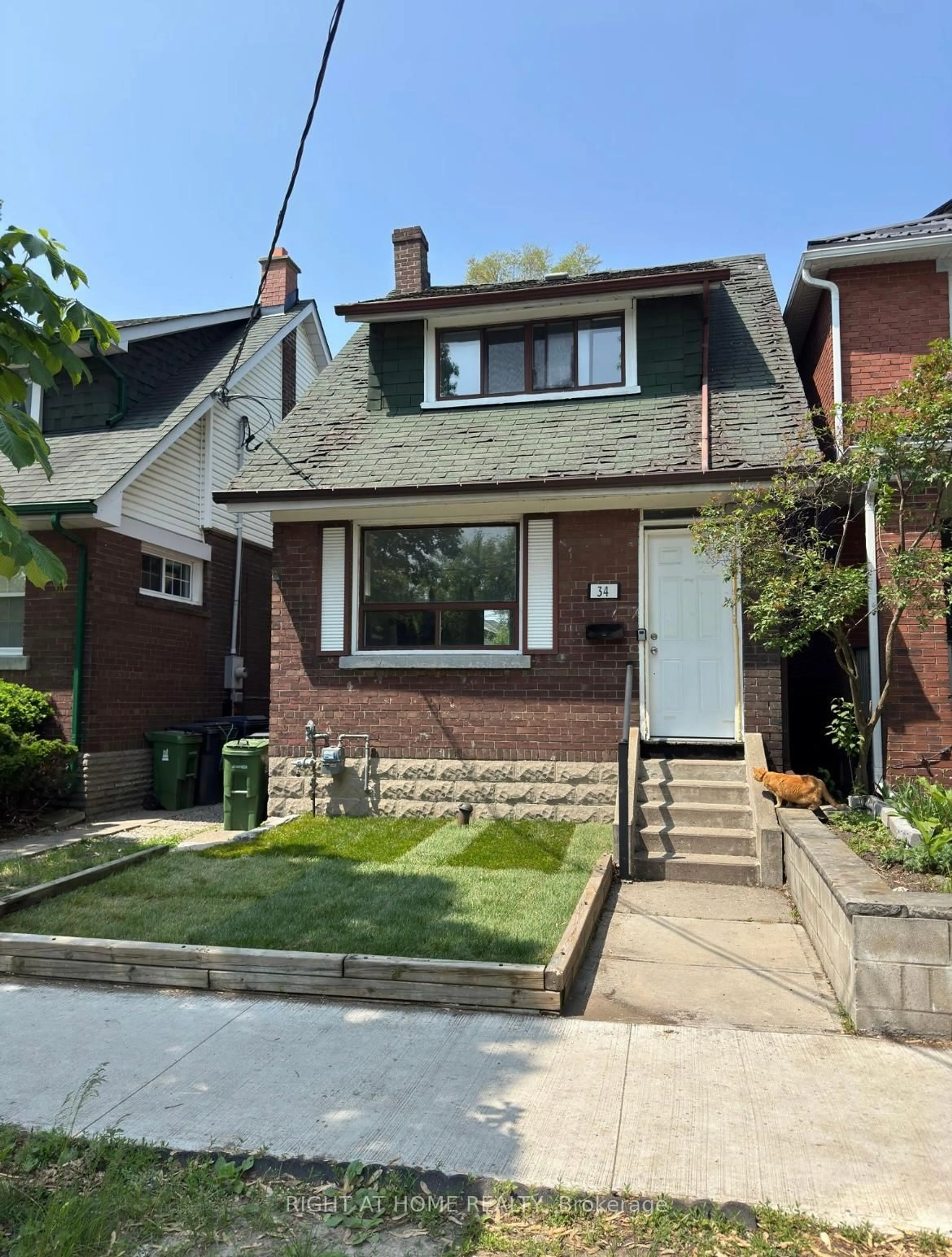 Home with brick exterior material, street for 34 Woodington Ave, Toronto Ontario M4C 3J3