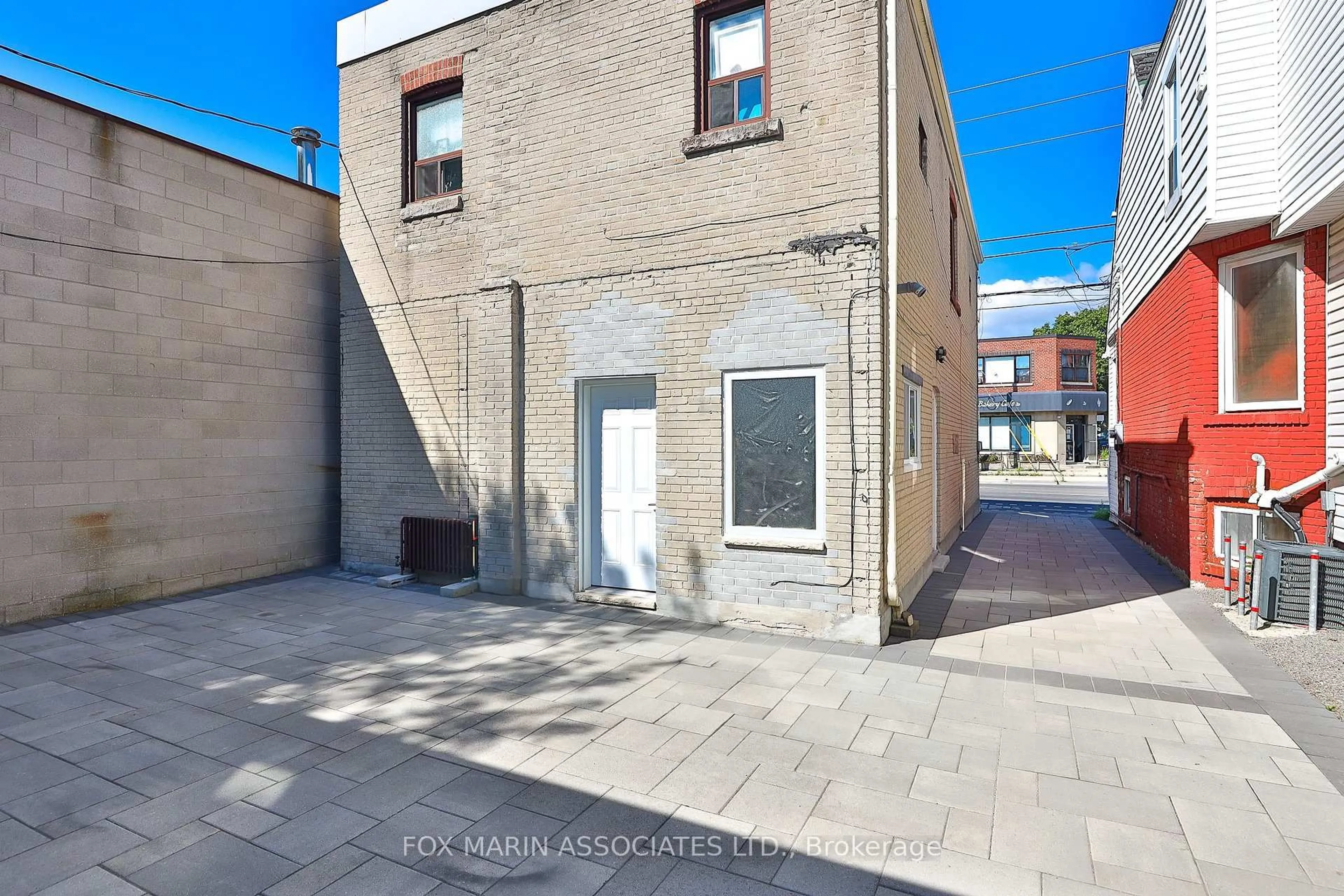 A pic from outside/outdoor area/front of a property/back of a property/a pic from drone, street for 1215 Woodbine Ave, Toronto Ontario M4C 4E1