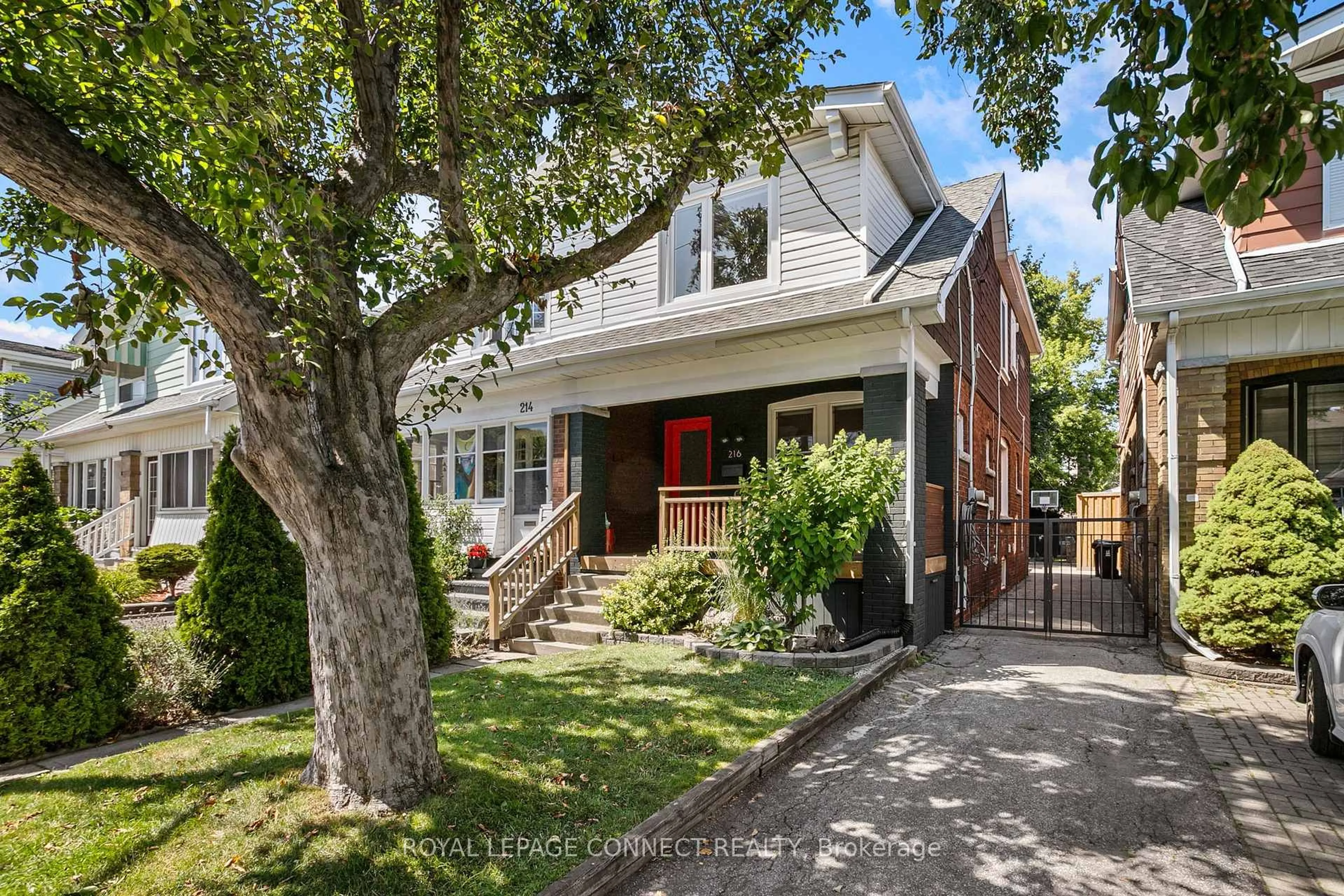 Home with brick exterior material, street for 216 Westwood Ave, Toronto Ontario M4J 2H4
