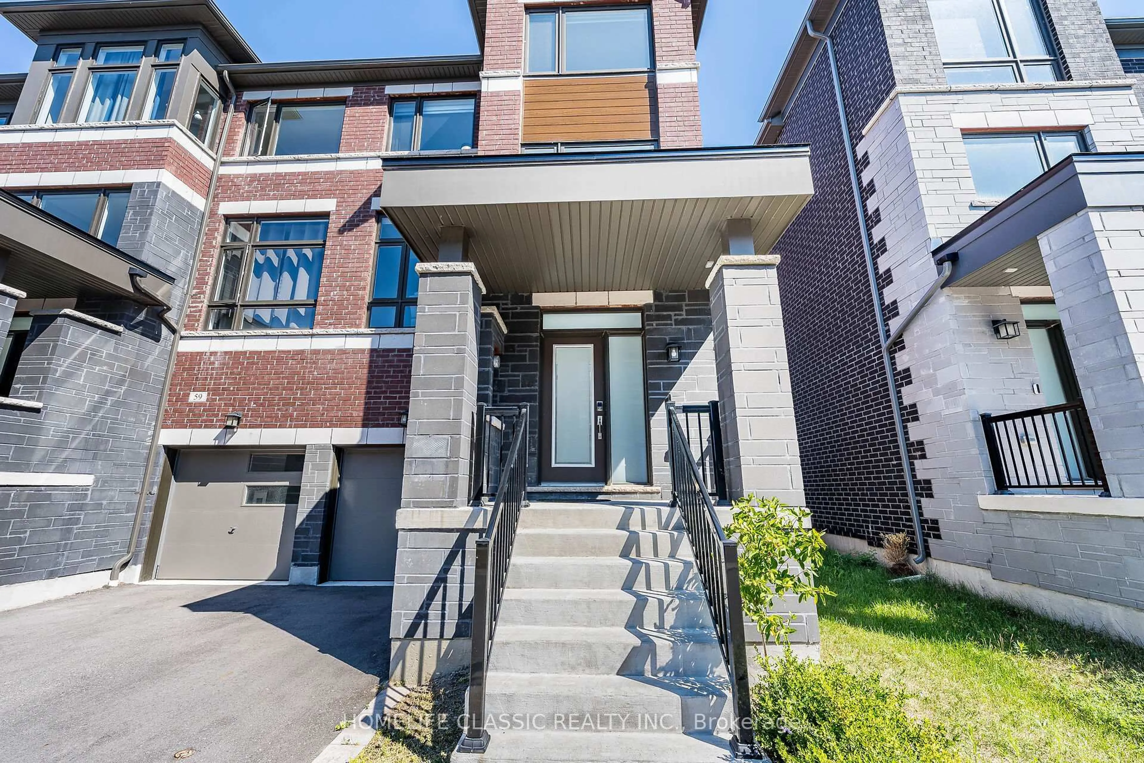 Home with brick exterior material, street for 57 Douet Lane, Ajax Ontario L1Z 0V4