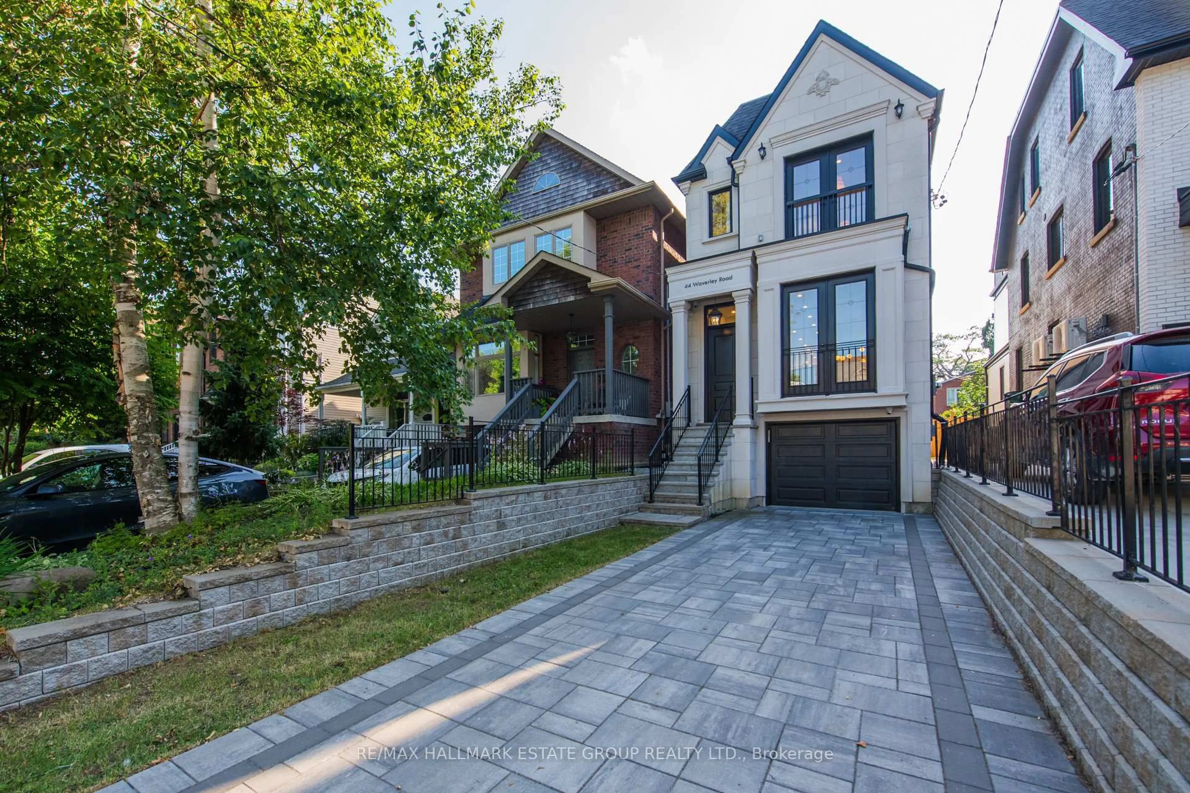 Home with brick exterior material, street for 44 Waverley Rd, Toronto Ontario M4L 3T1