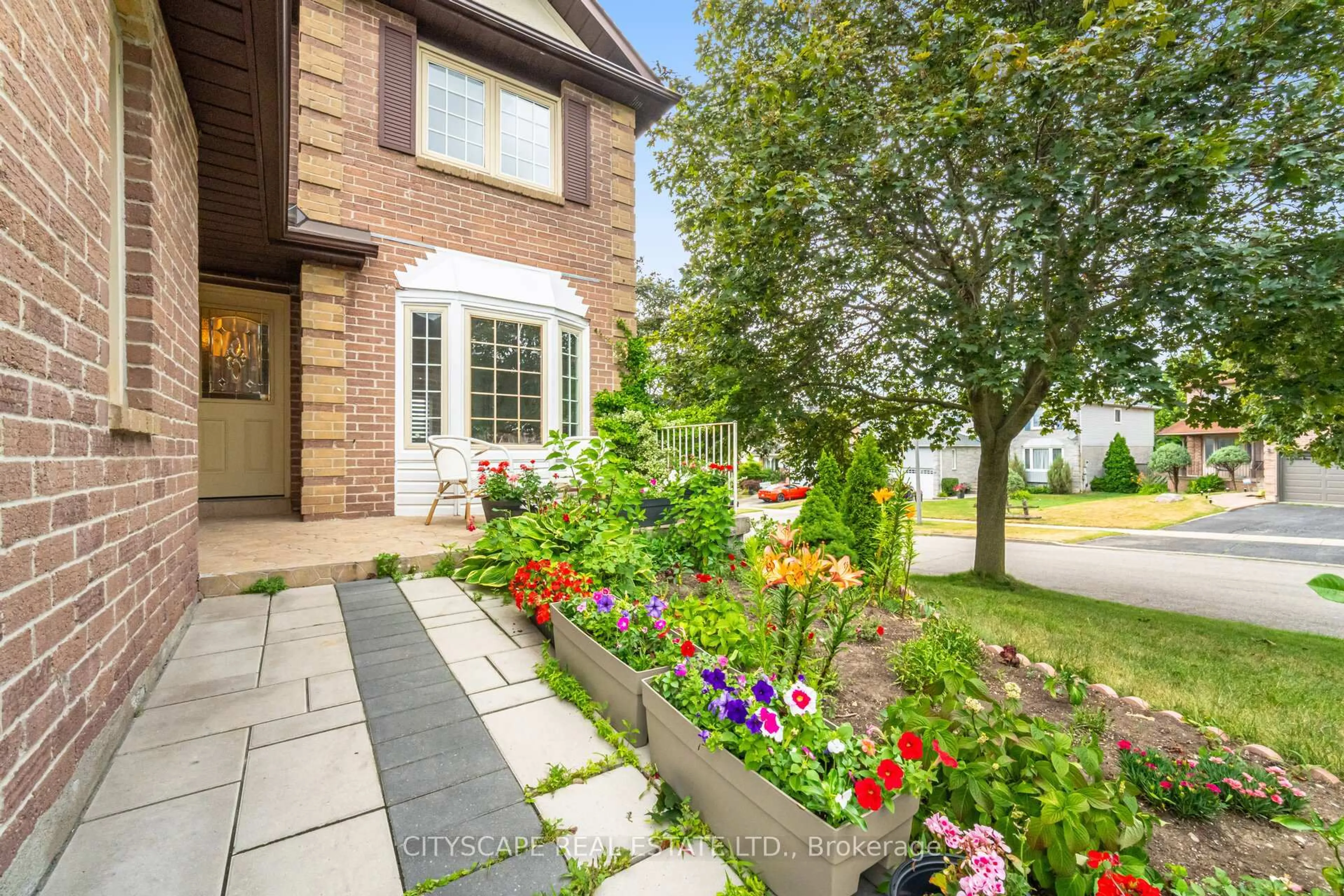 Home with brick exterior material, street for 12 Coomer Cres, Ajax Ontario L1T 3B6