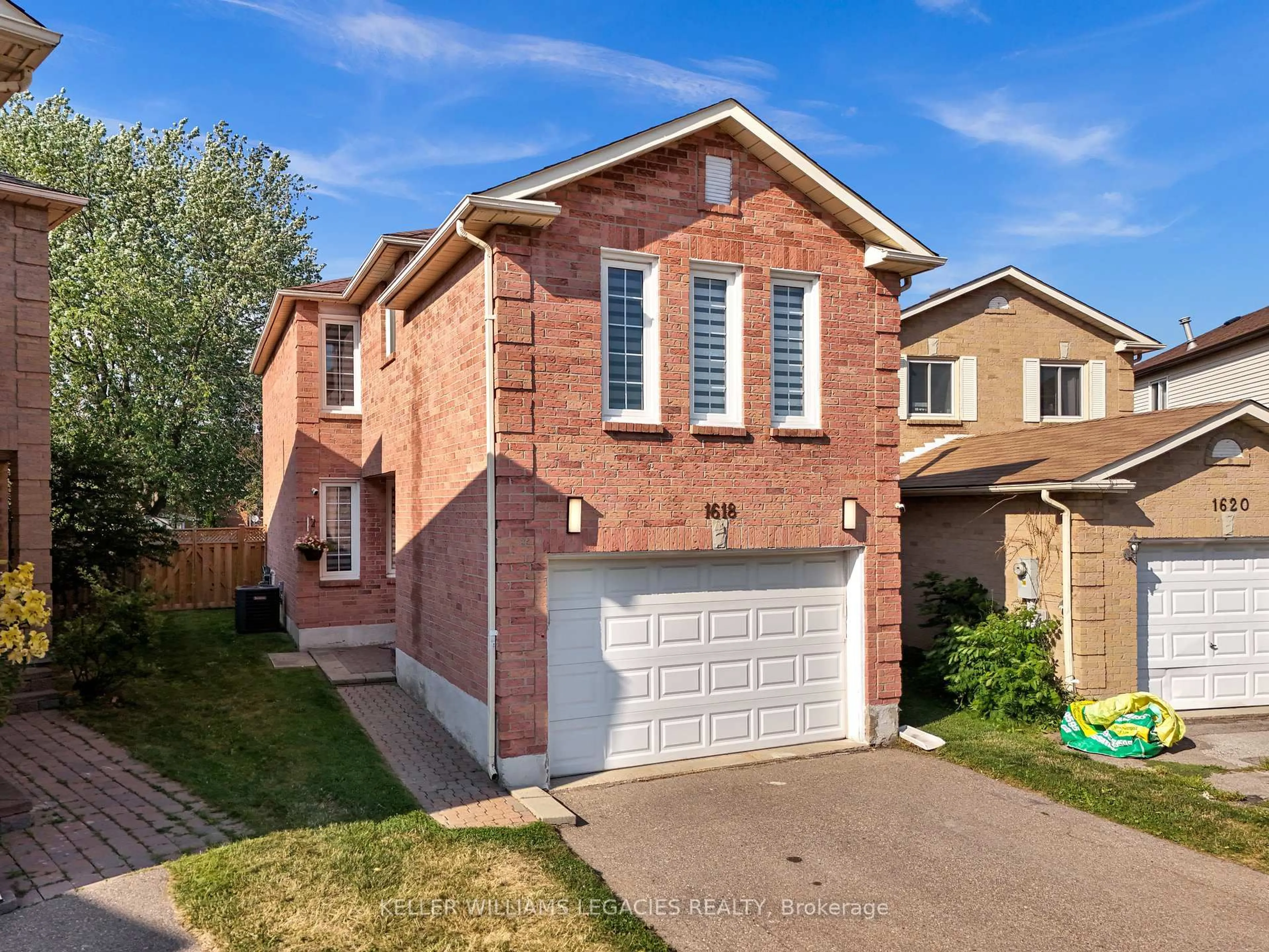 Home with brick exterior material, street for 1618 Tawnberry St, Pickering Ontario L1X 2C3