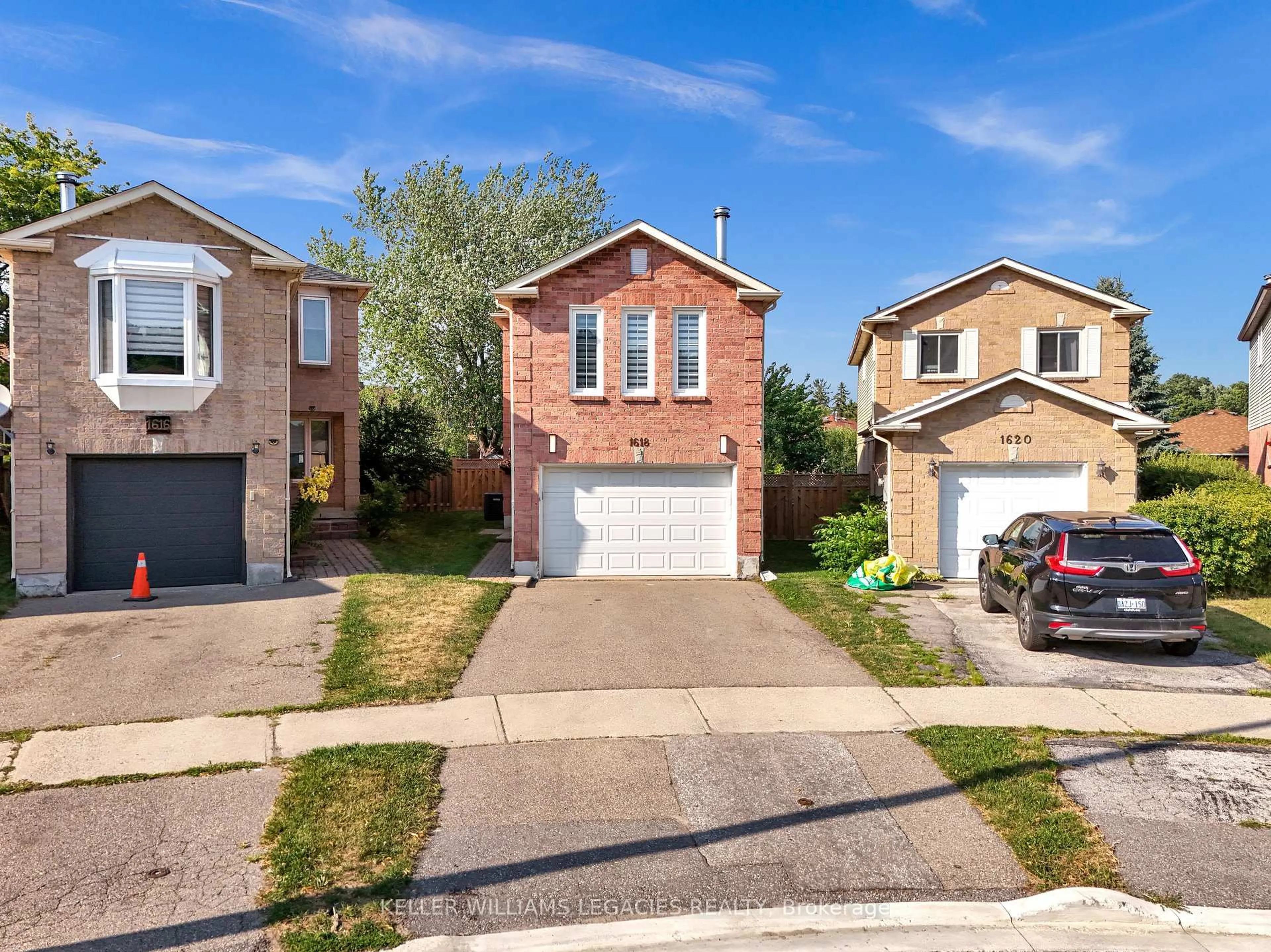 Home with brick exterior material, street for 1618 Tawnberry St, Pickering Ontario L1X 2C3