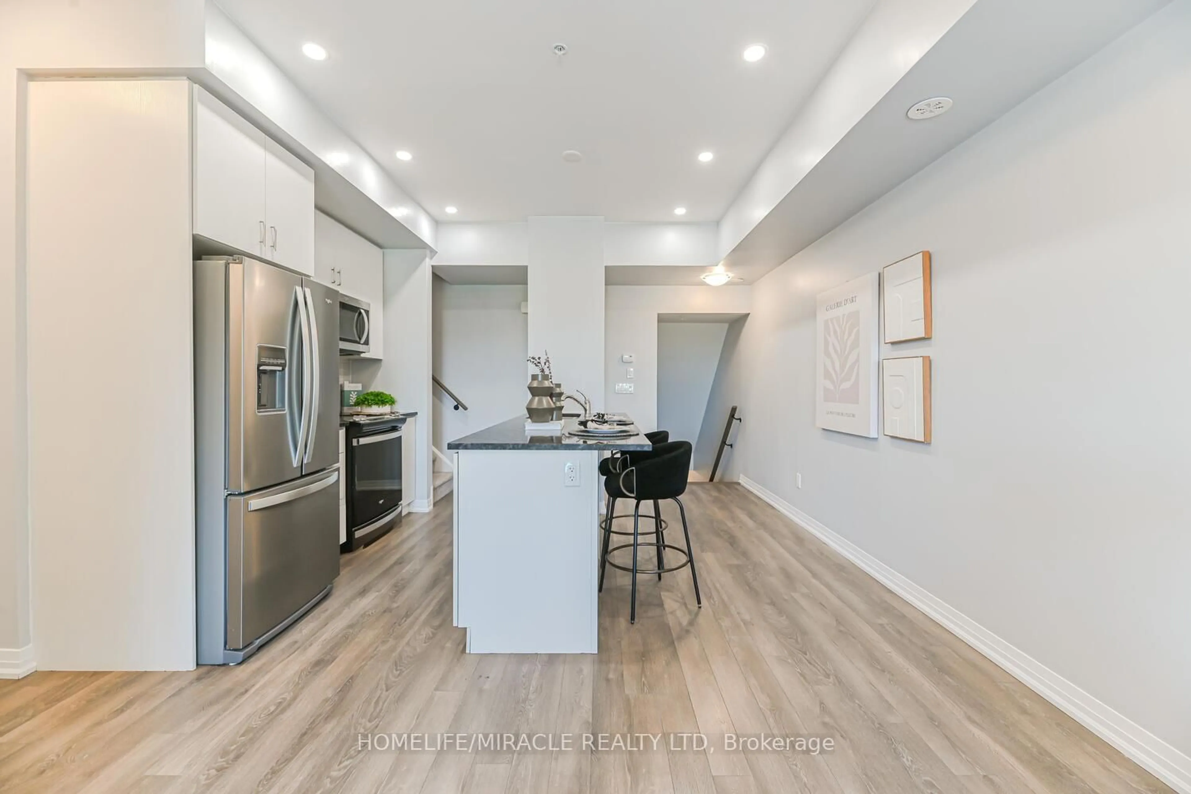 Open concept kitchen, unknown for 2635 William Jackson Dr #723, Pickering Ontario L1P 2V8