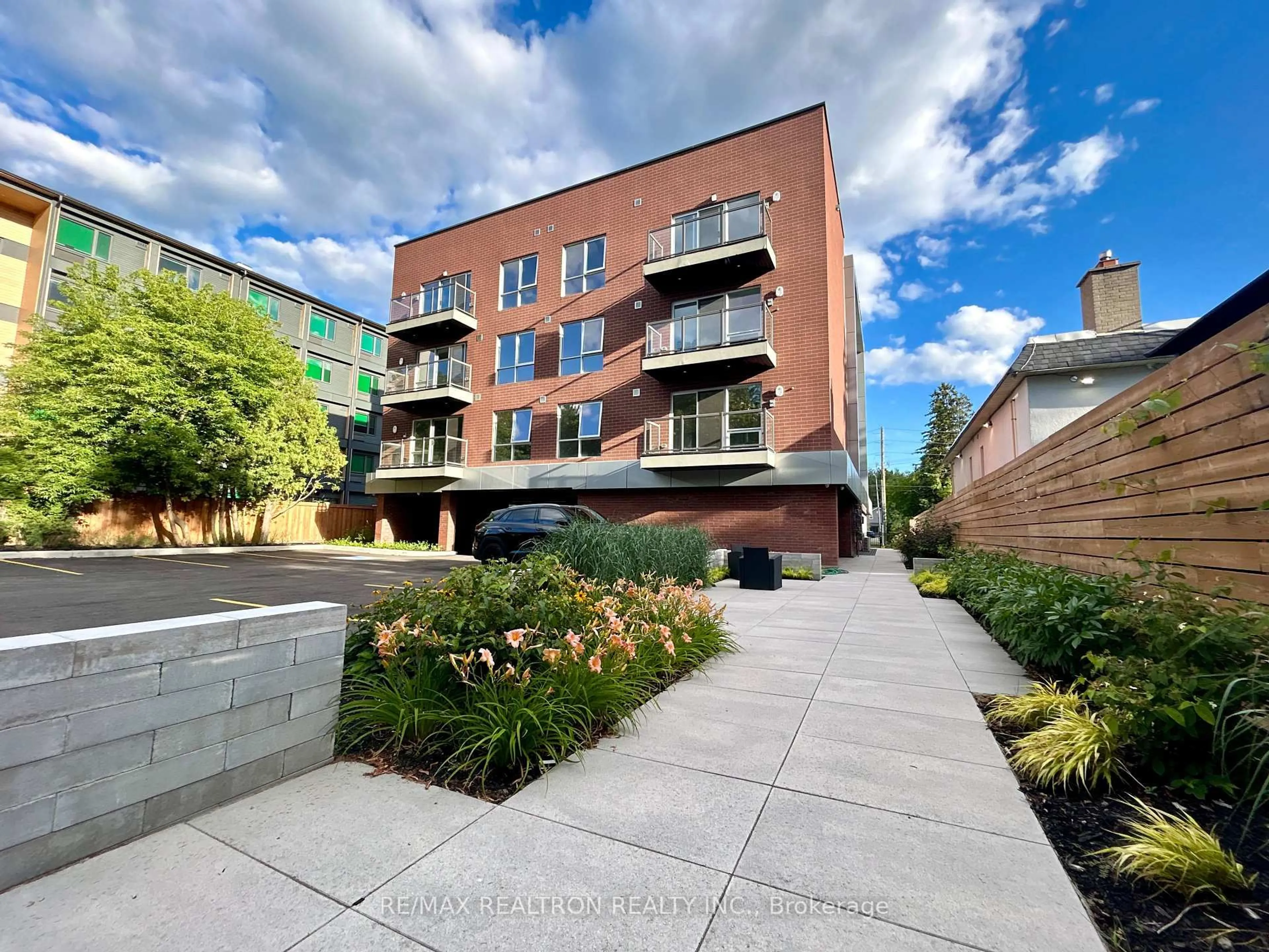 A pic from outside/outdoor area/front of a property/back of a property/a pic from drone, unknown for 61 Orchard Park Dr #304, Toronto Ontario M1E 0C8