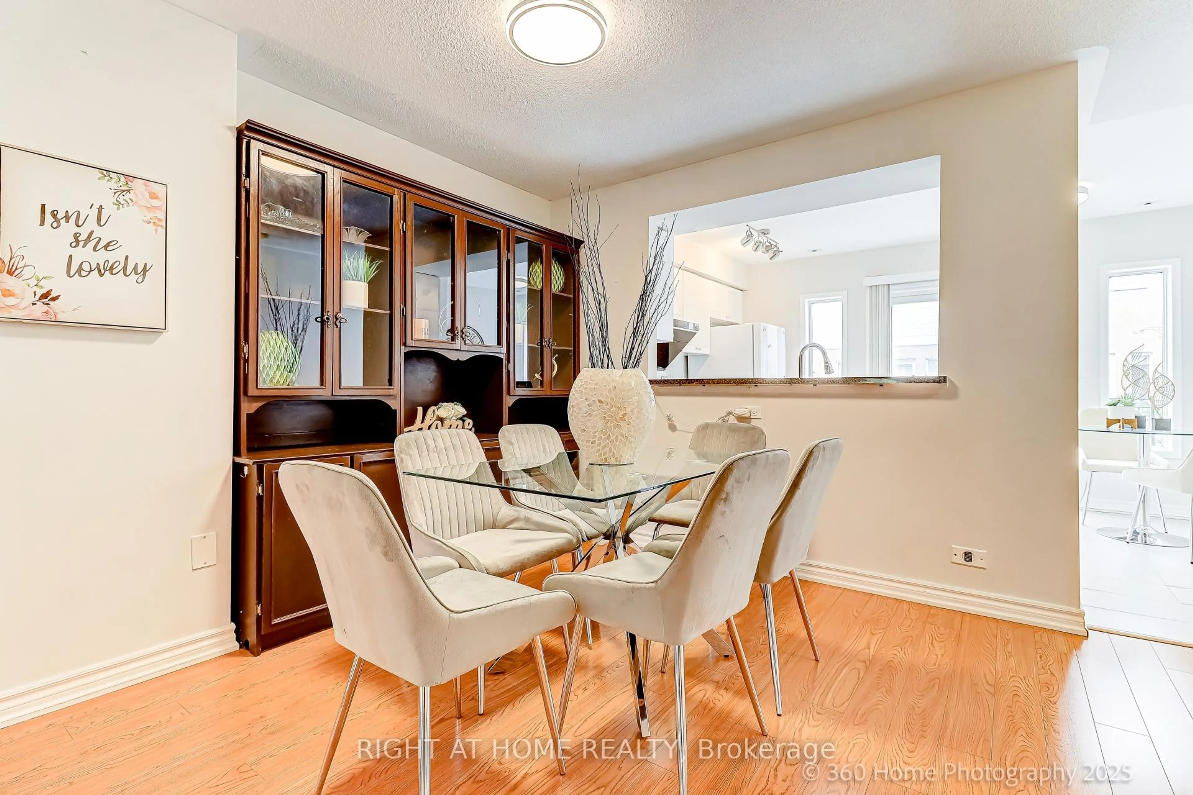 Dining room, wood/laminate floor for 83 Mondeo Dr #290, Toronto Ontario M1P 5B6