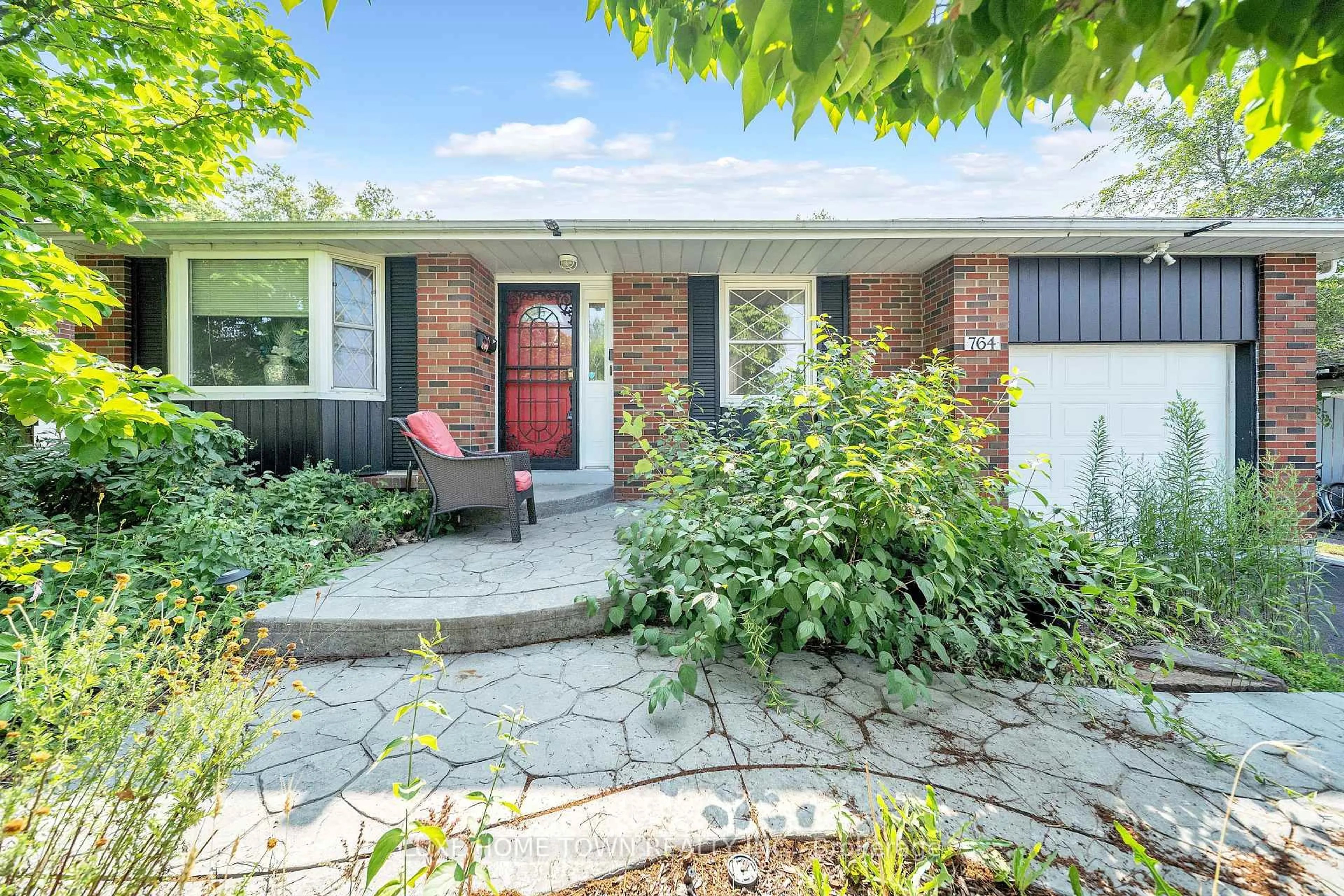 Home with brick exterior material, street for 764 Hillcrest Rd, Pickering Ontario L1W 2P4