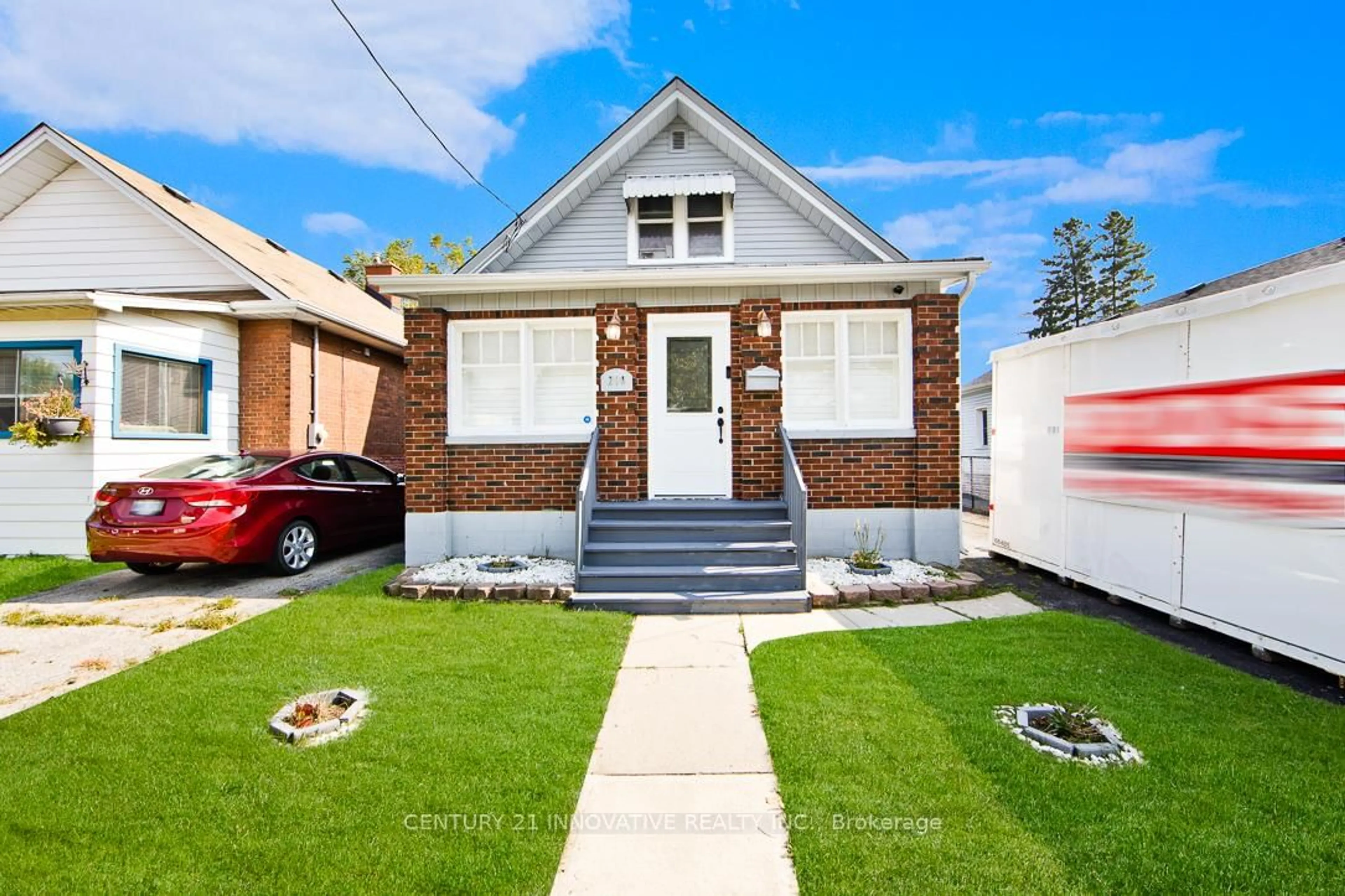 Home with brick exterior material, street for 219 Verdun Rd, Oshawa Ontario L1H 5T1