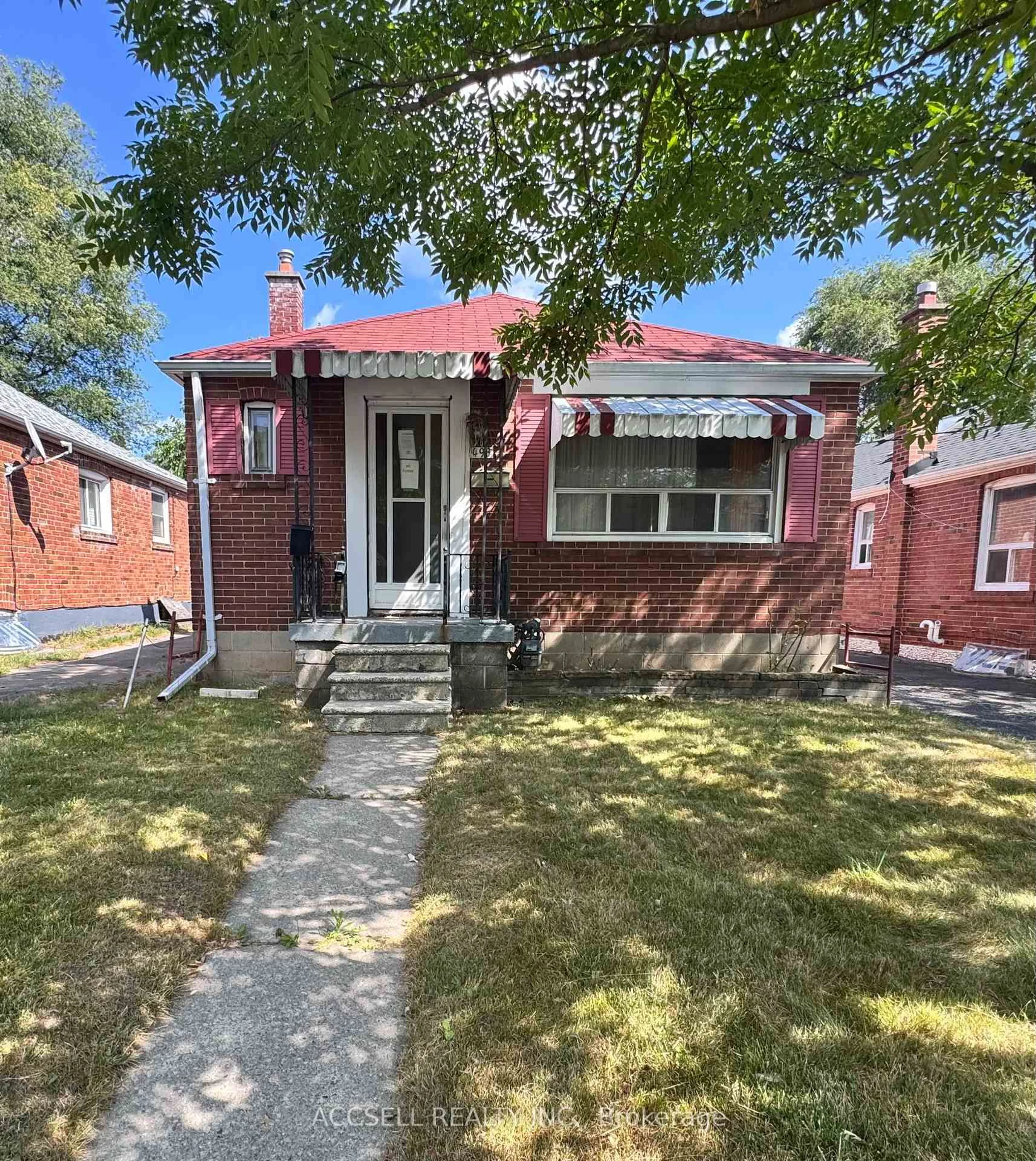 Home with brick exterior material, street for 493 Dawes Rd, Toronto Ontario M4B 2G5
