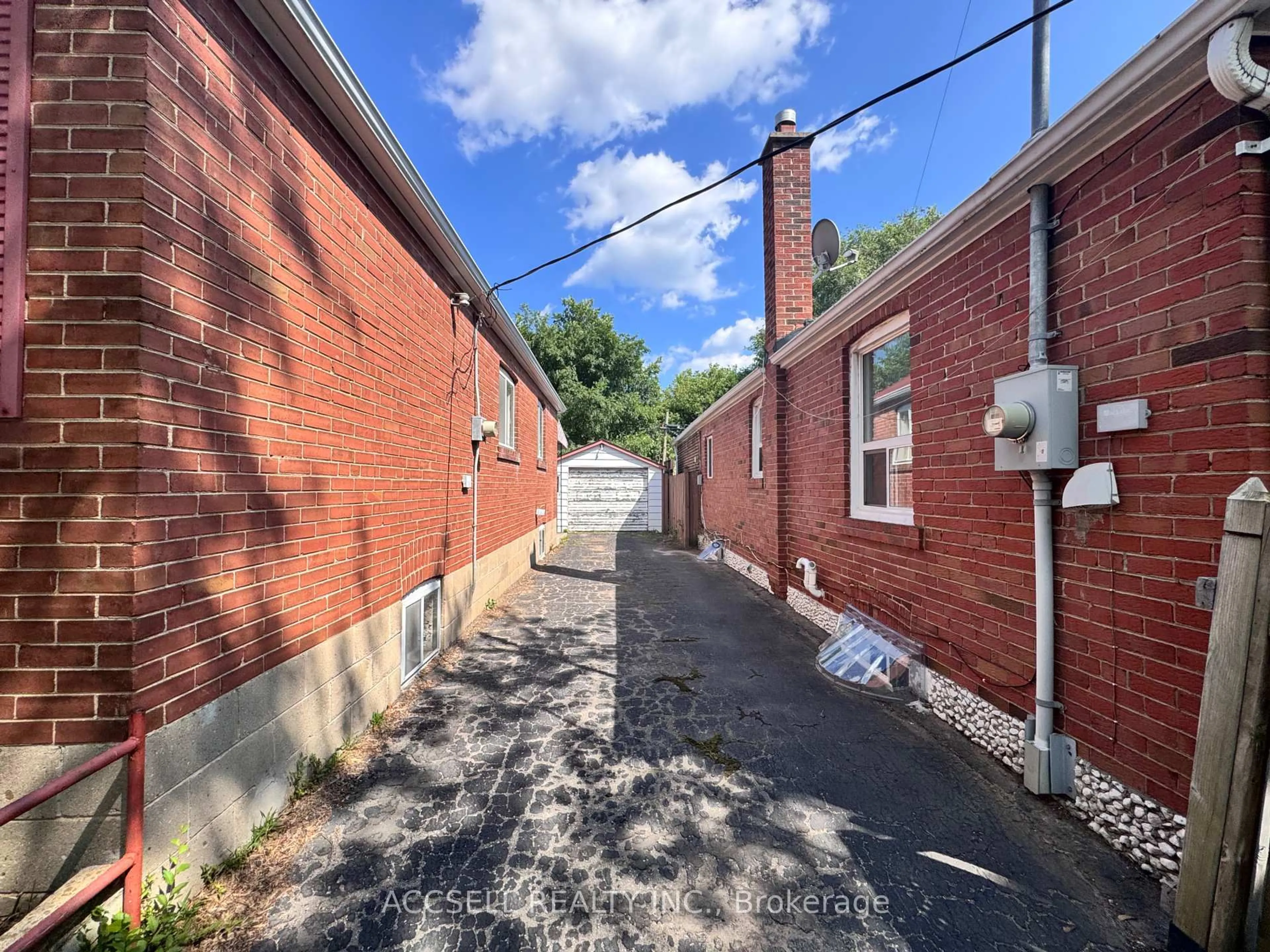 A pic from outside/outdoor area/front of a property/back of a property/a pic from drone, street for 493 Dawes Rd, Toronto Ontario M4B 2G5