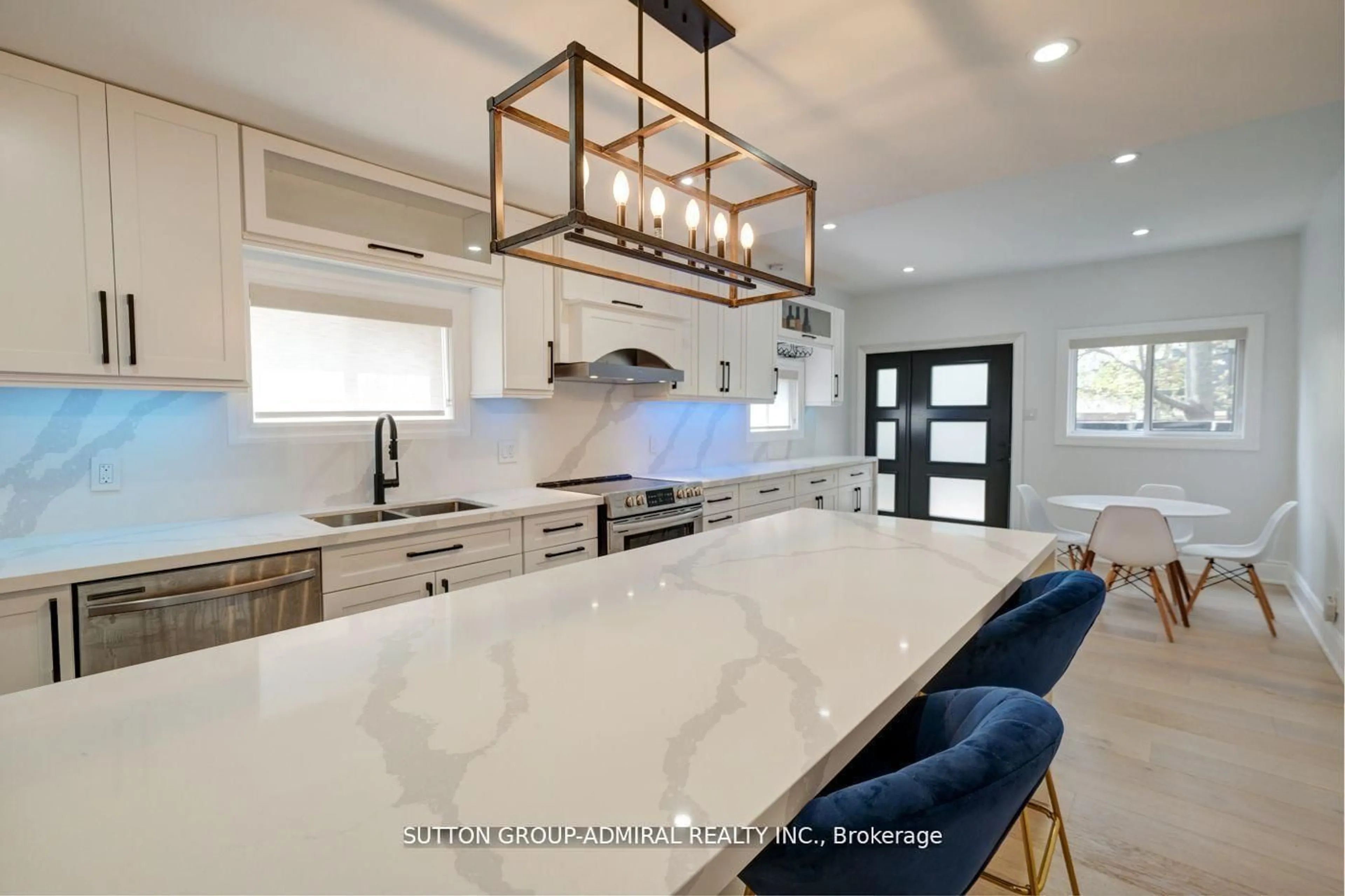 Open concept kitchen, ceramic/tile floor for 70 Carlaw Ave, Toronto Ontario M4M 2R7