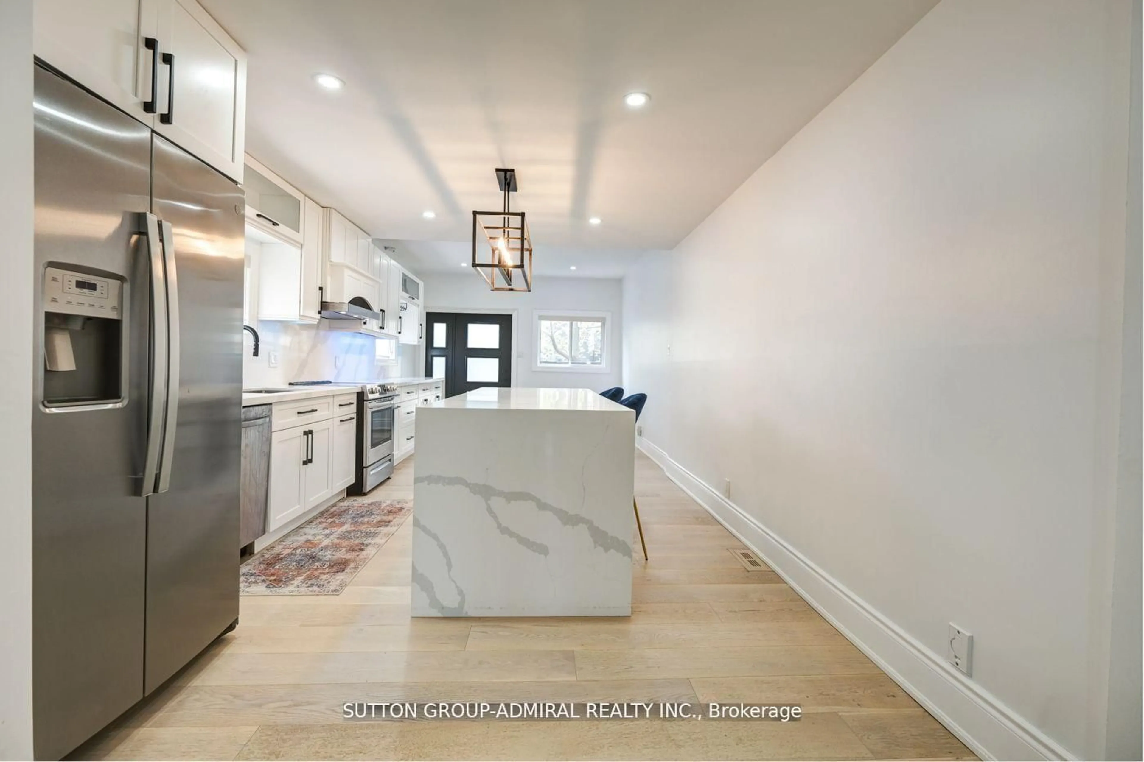 Open concept kitchen, ceramic/tile floor for 70 Carlaw Ave, Toronto Ontario M4M 2R7