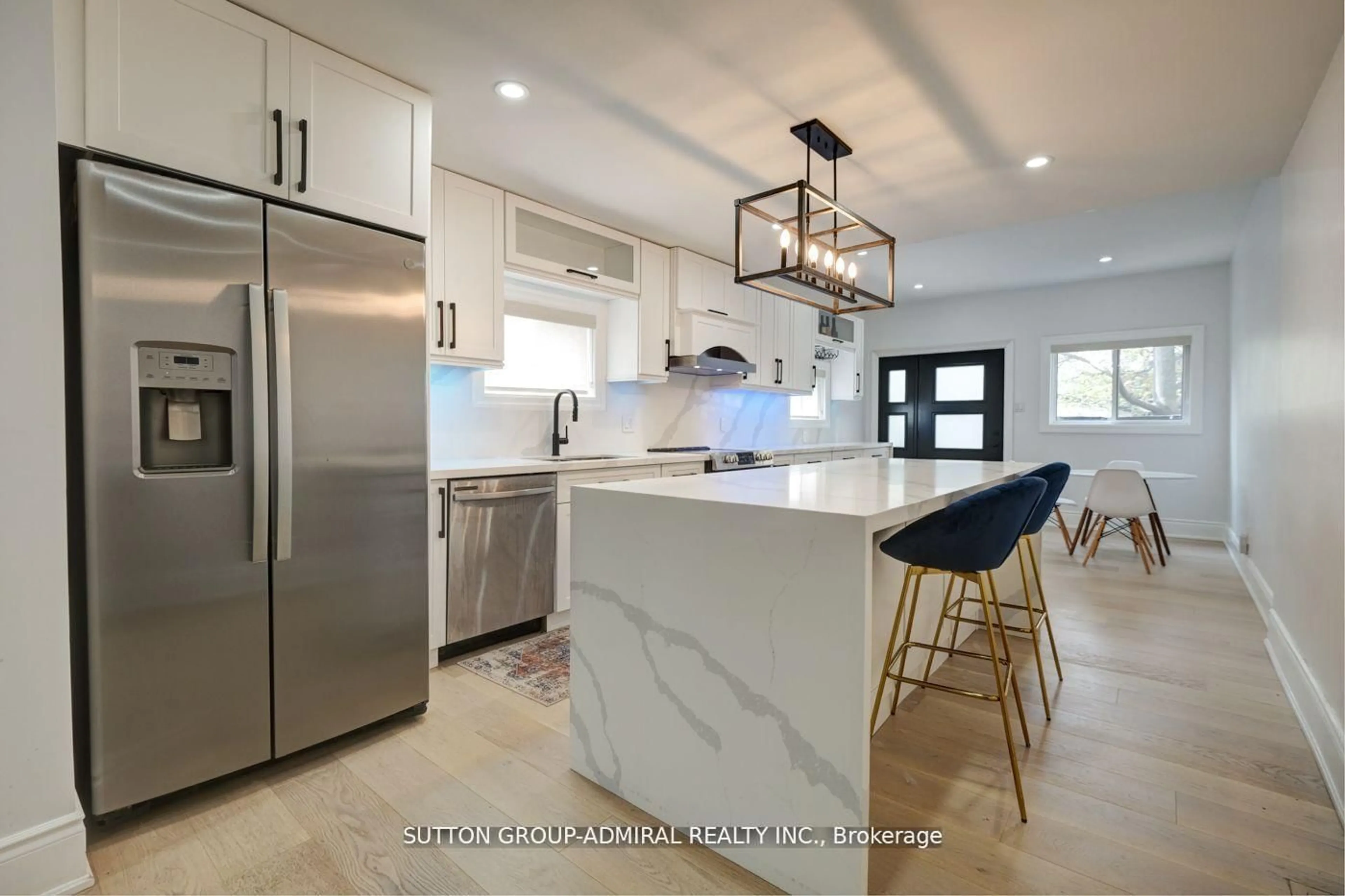 Open concept kitchen, ceramic/tile floor for 70 Carlaw Ave, Toronto Ontario M4M 2R7