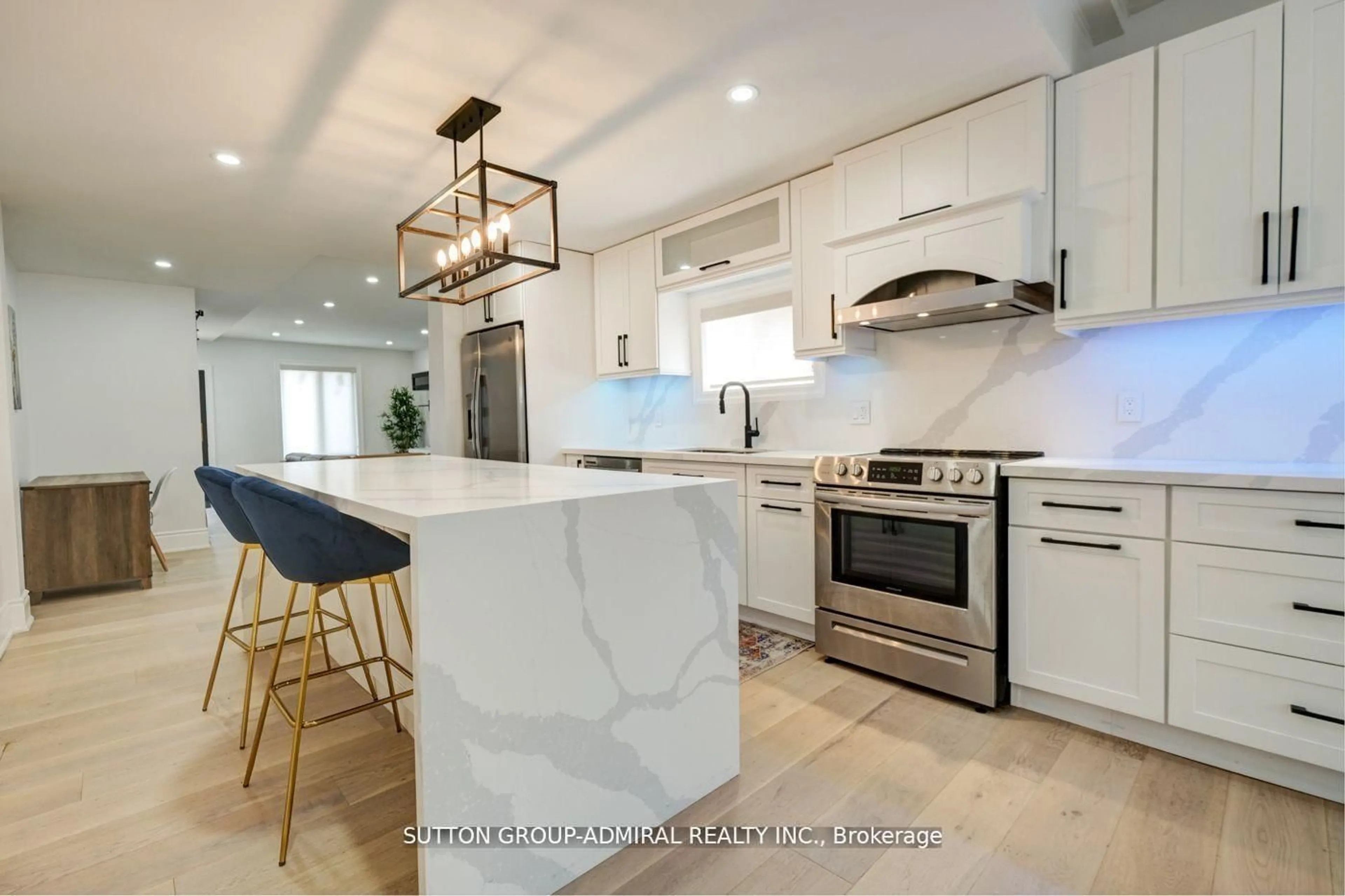 Open concept kitchen, ceramic/tile floor for 70 Carlaw Ave, Toronto Ontario M4M 2R7