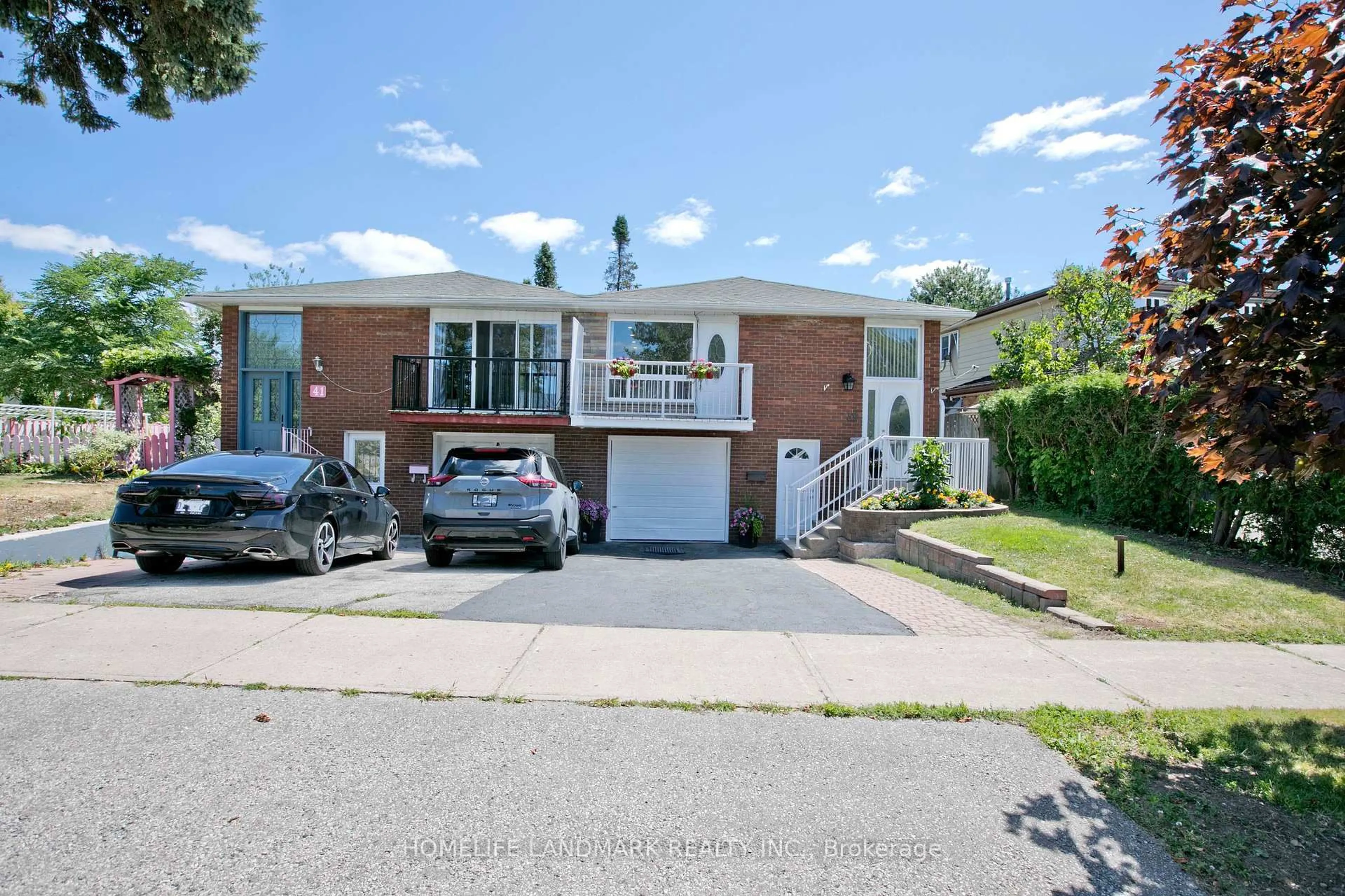 Home with brick exterior material, street for 39 La Peer Blvd, Toronto Ontario M1W 2H3