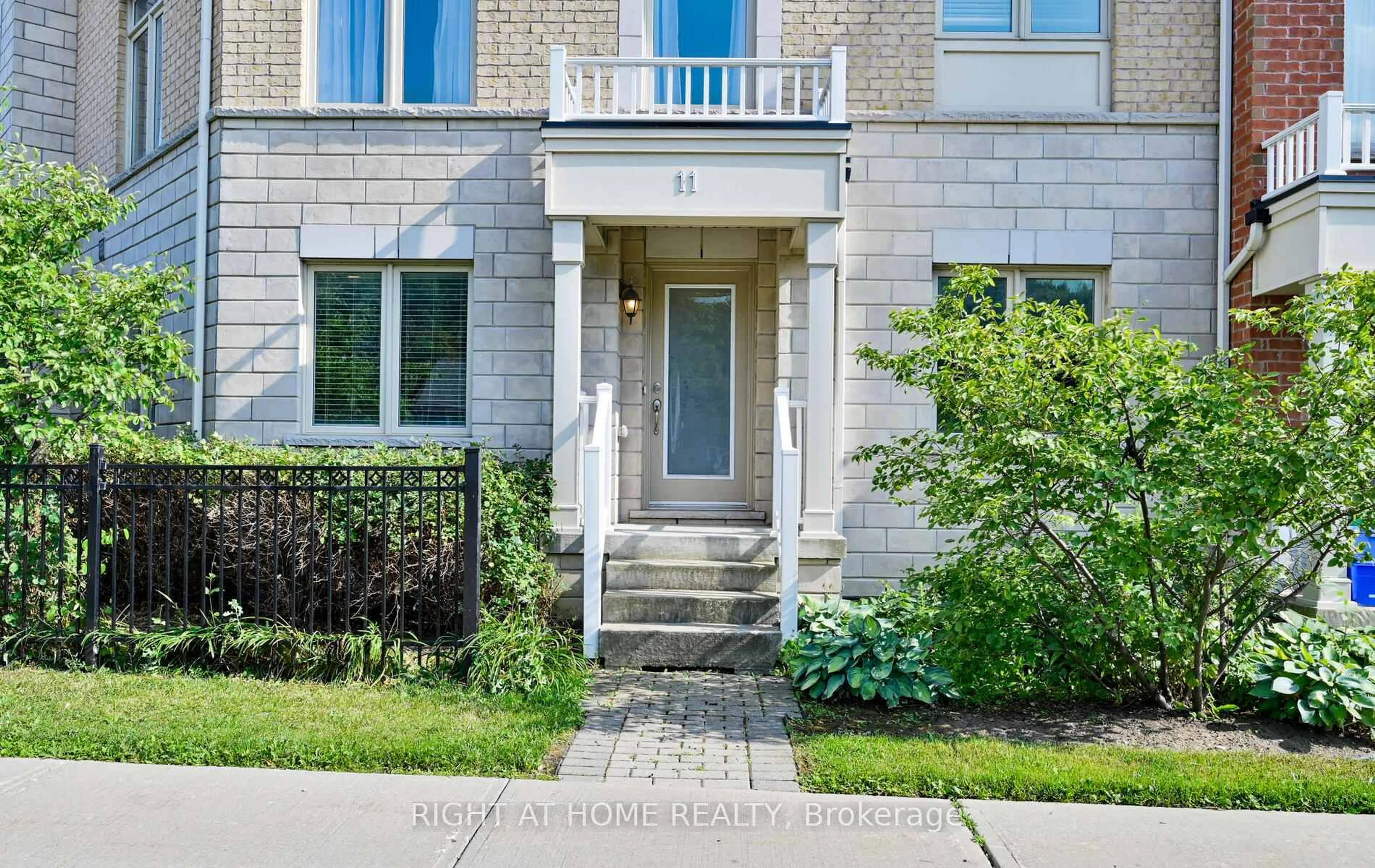 Home with brick exterior material, street for 1299 Glenanna Rd #11, Pickering Ontario L1V 3B7