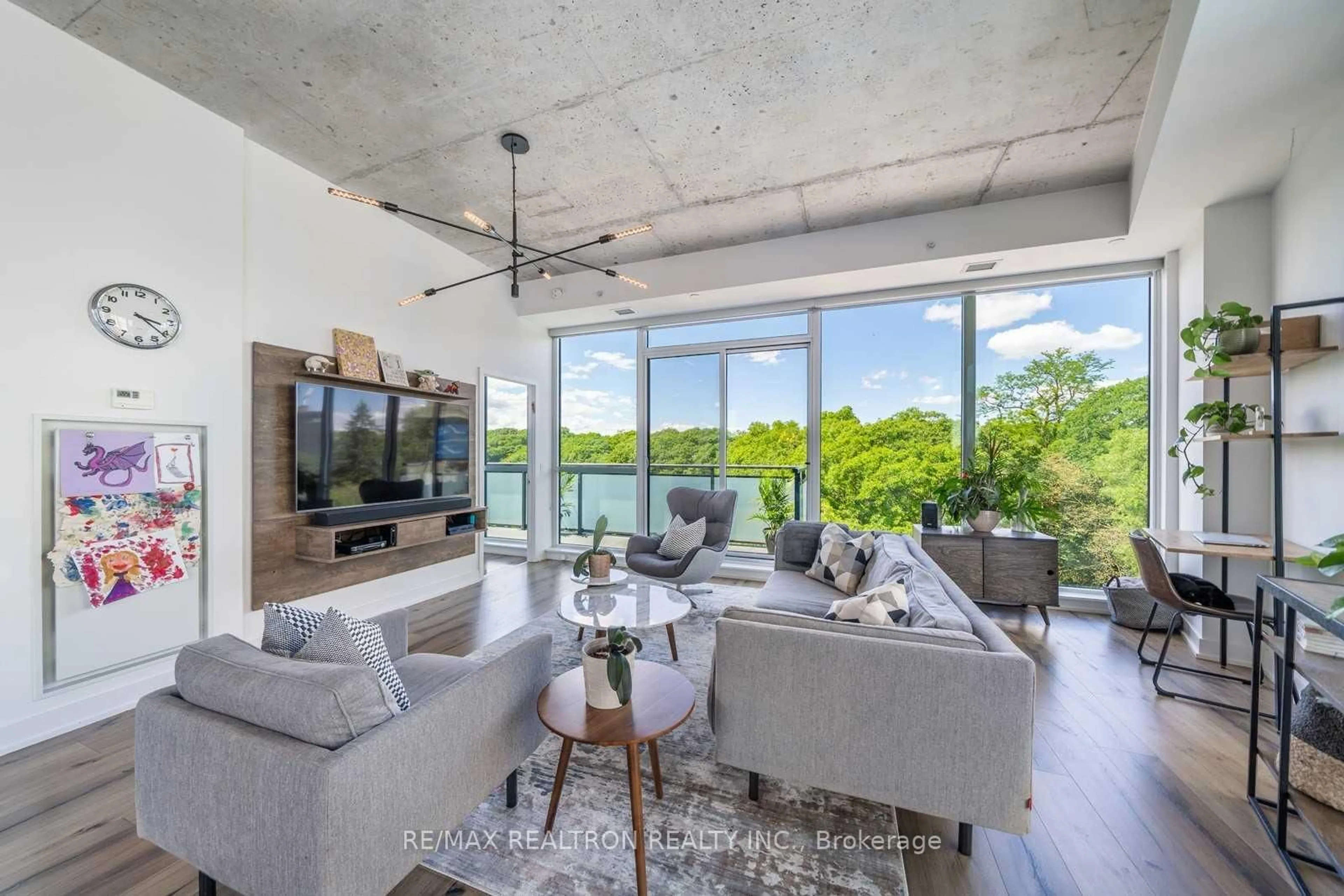 Living room with furniture, cement floor for 630 Kingston Rd #Ph602, Toronto Ontario M4E 1P9