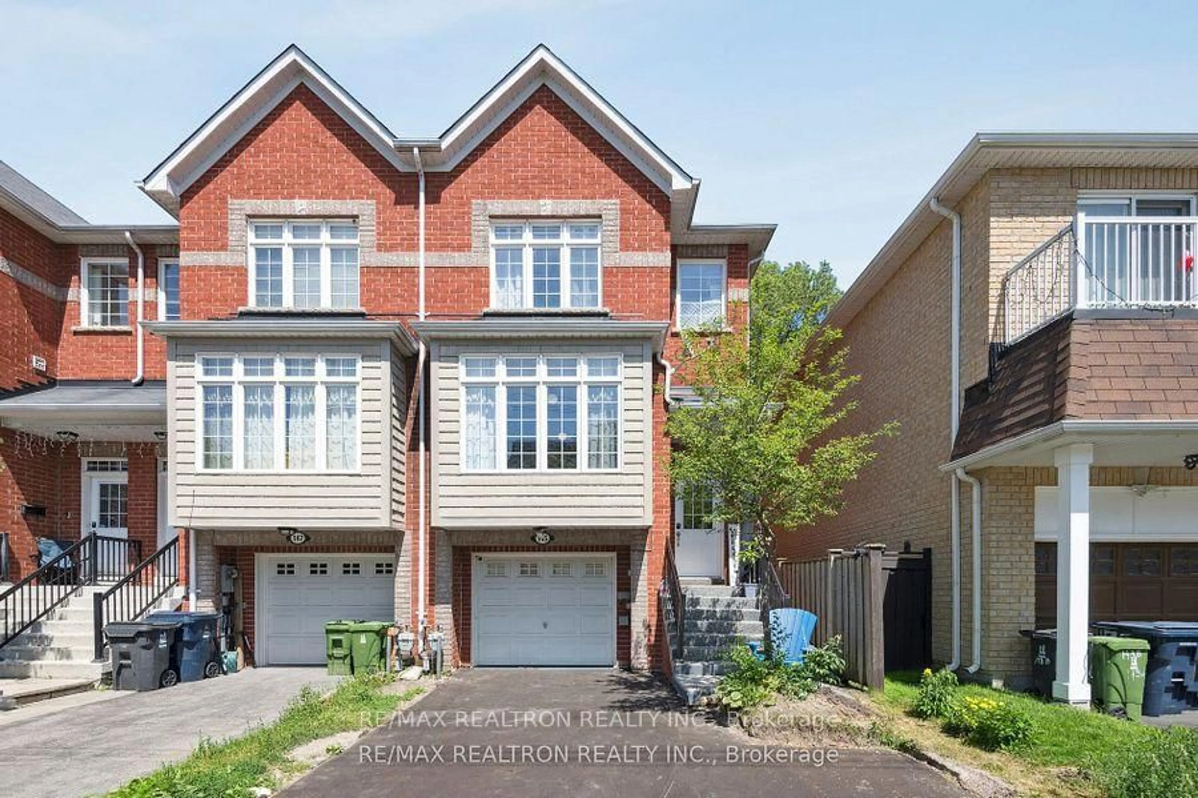 Home with brick exterior material, street for 145 Homestead Rd, Toronto Ontario M1E 3S1
