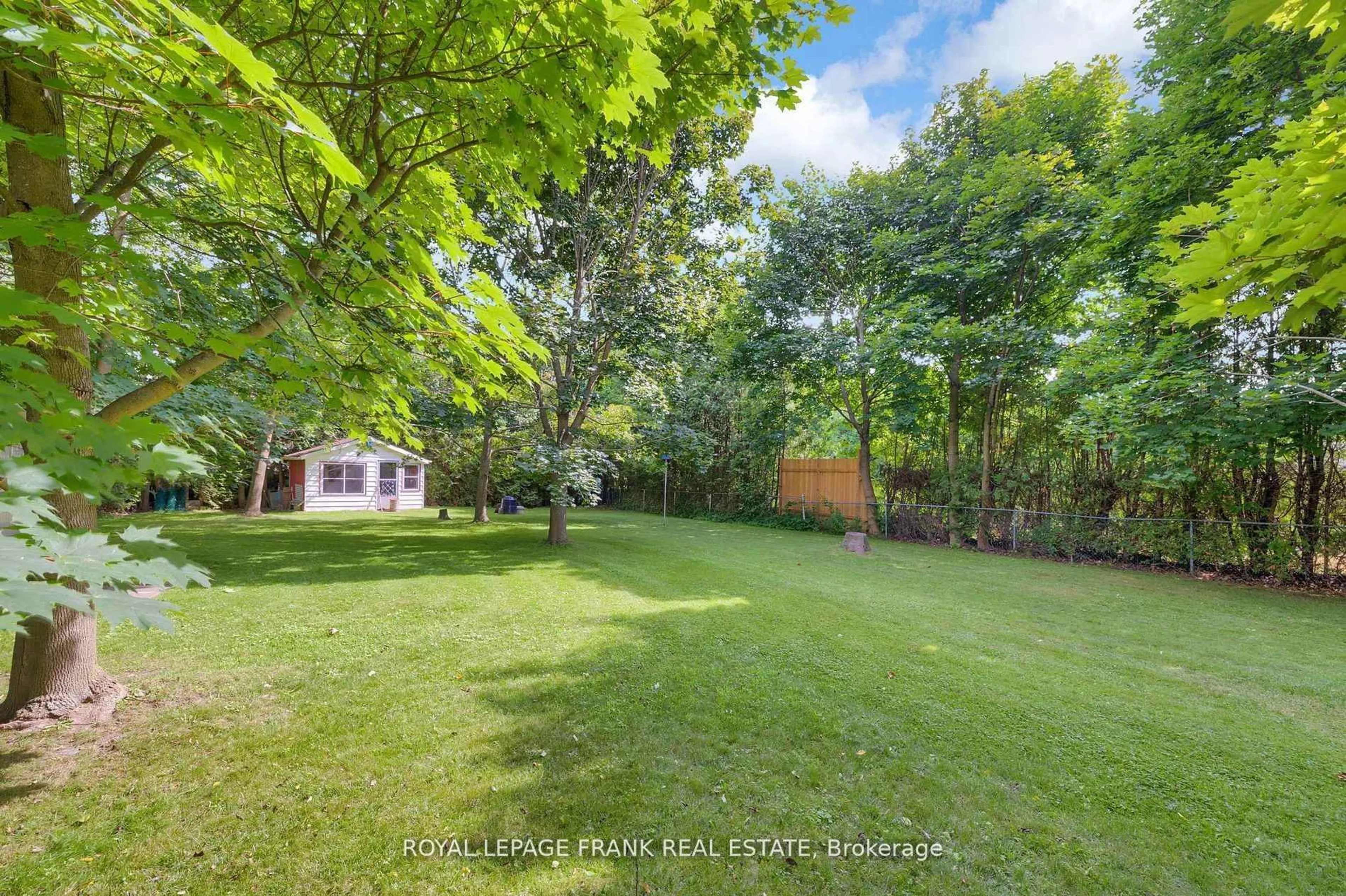 A pic from outside/outdoor area/front of a property/back of a property/a pic from drone, forest/trees view for 17 Phair Ave, Clarington Ontario L1E 2W5