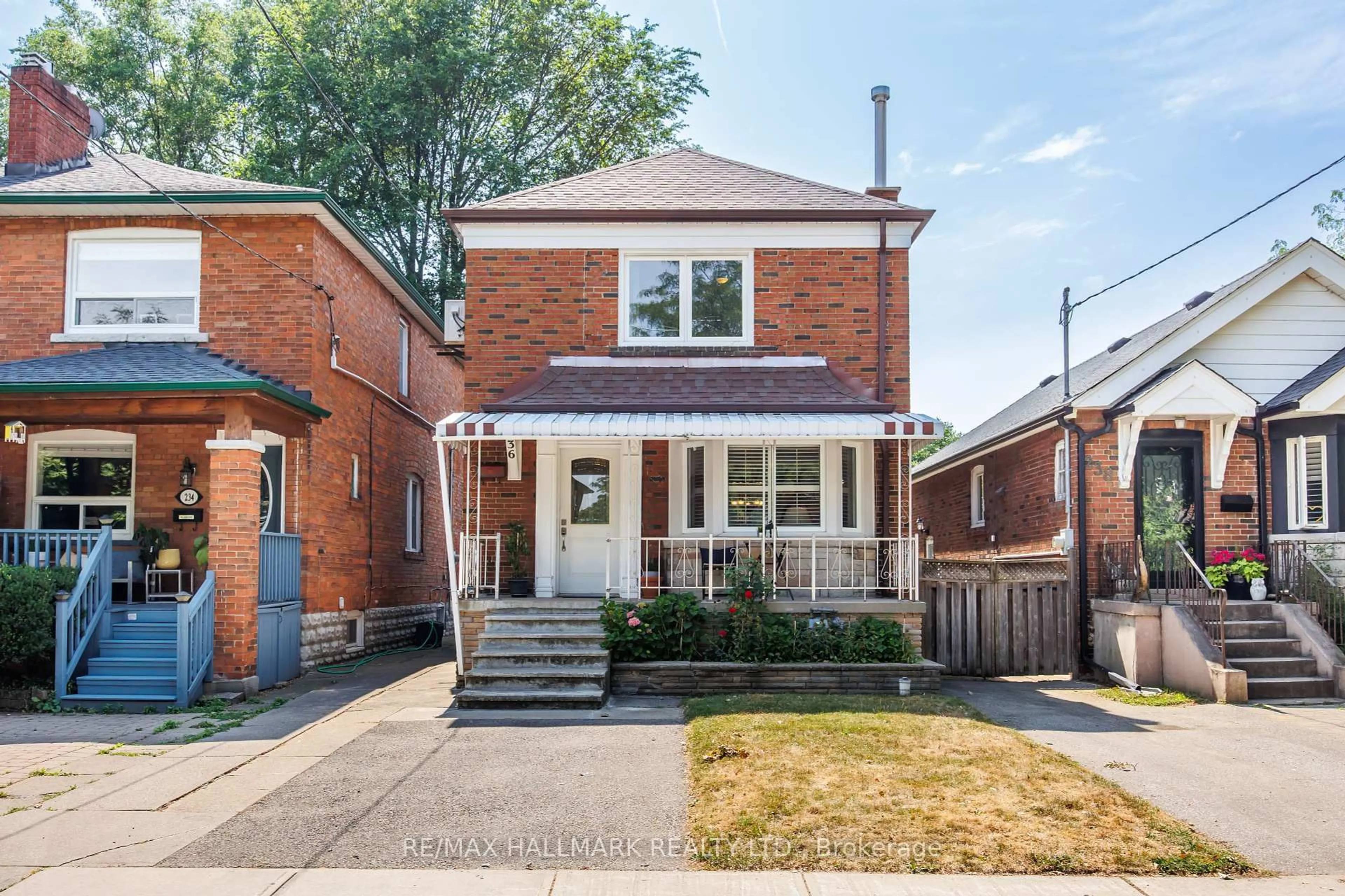 Home with brick exterior material, street for 236 Dewhurst Blvd, Toronto Ontario M4J 3K5