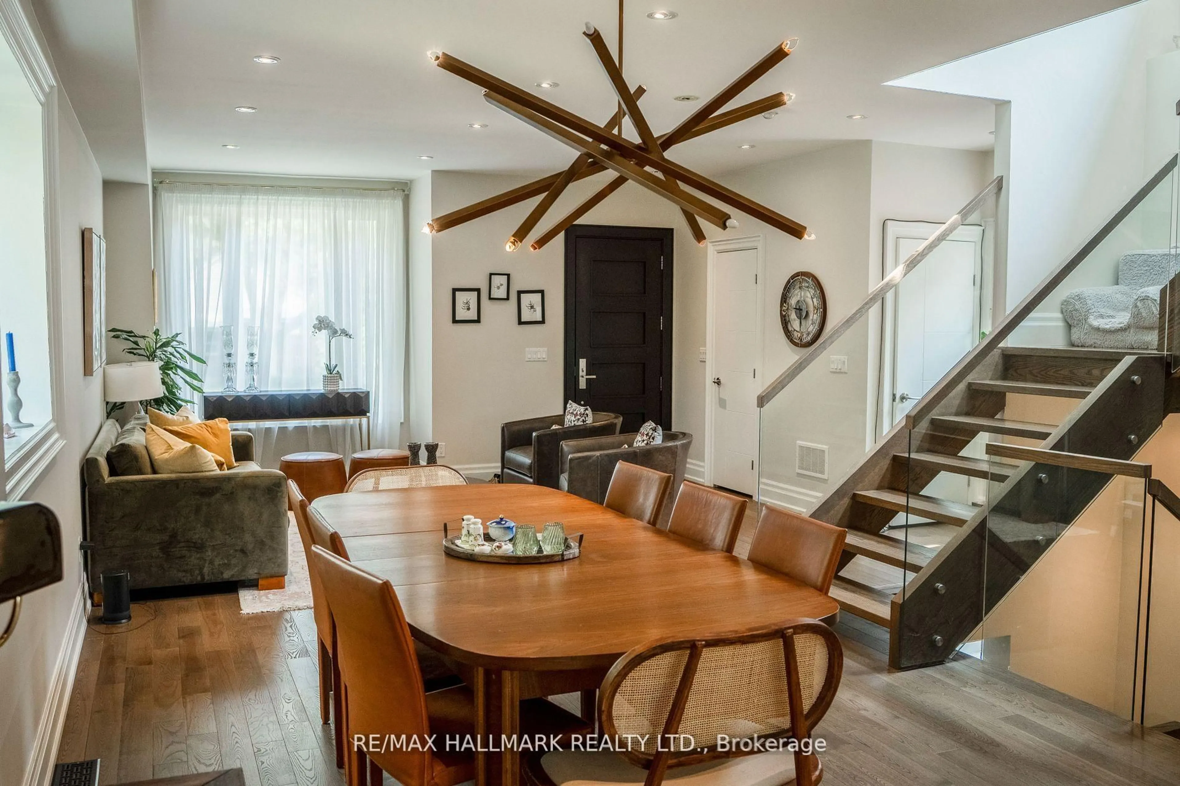 Dining room, wood/laminate floor for 344 Glebemount Ave, Toronto Ontario M4C 3V5