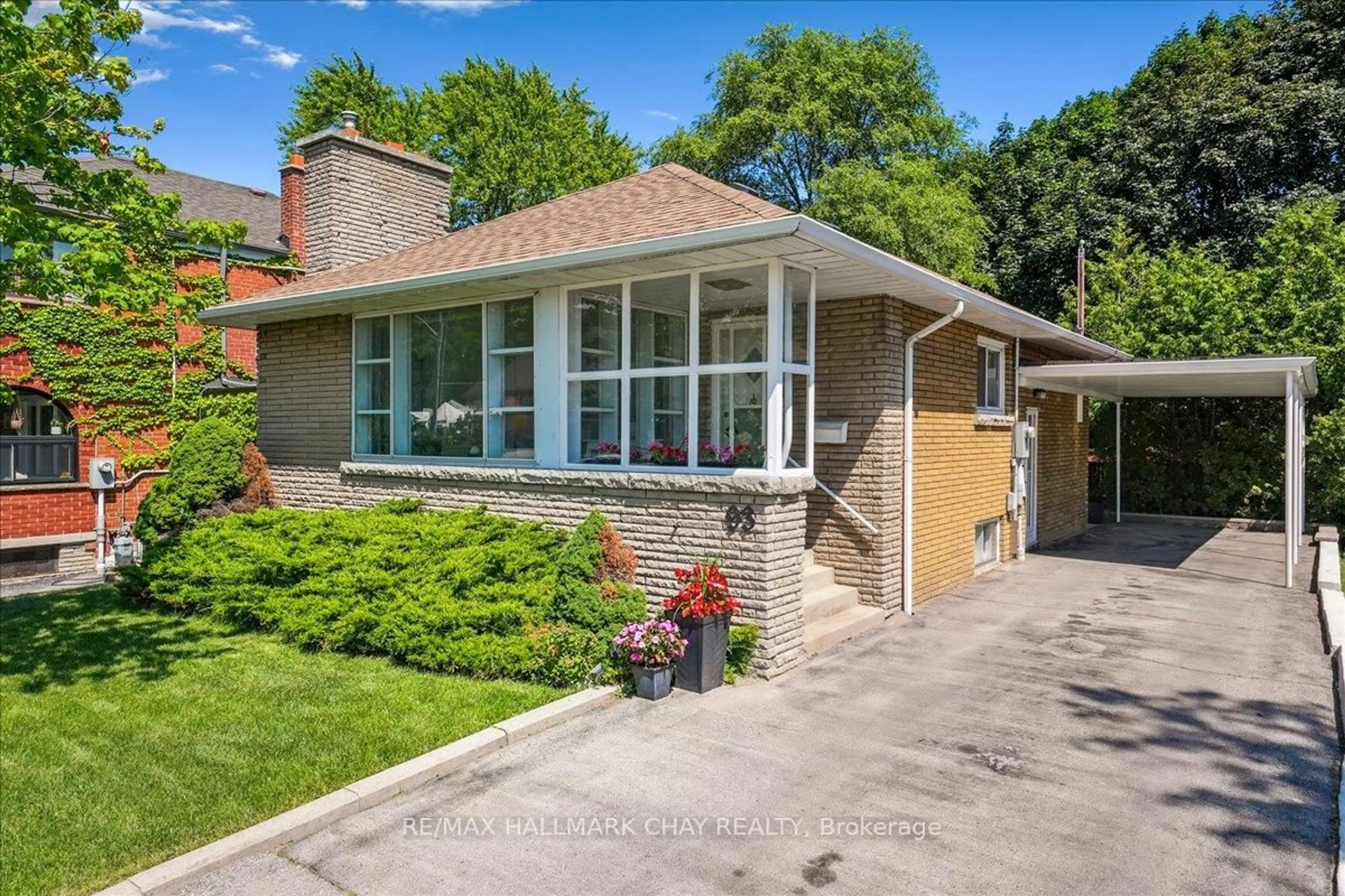 Home with brick exterior material, street for 93 Clonmore Dr, Toronto Ontario M1N 1X9