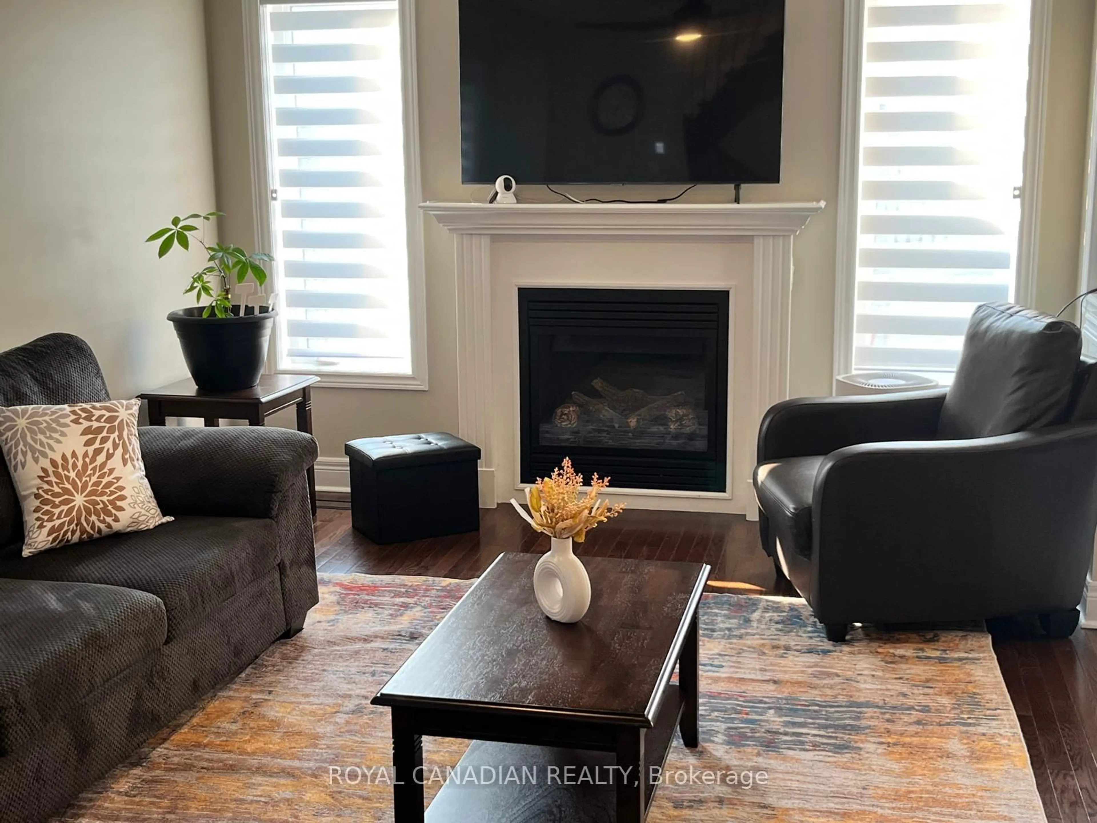 Living room with furniture, wood/laminate floor for 181 Bathgate Cres, Clarington Ontario L1E 0B6