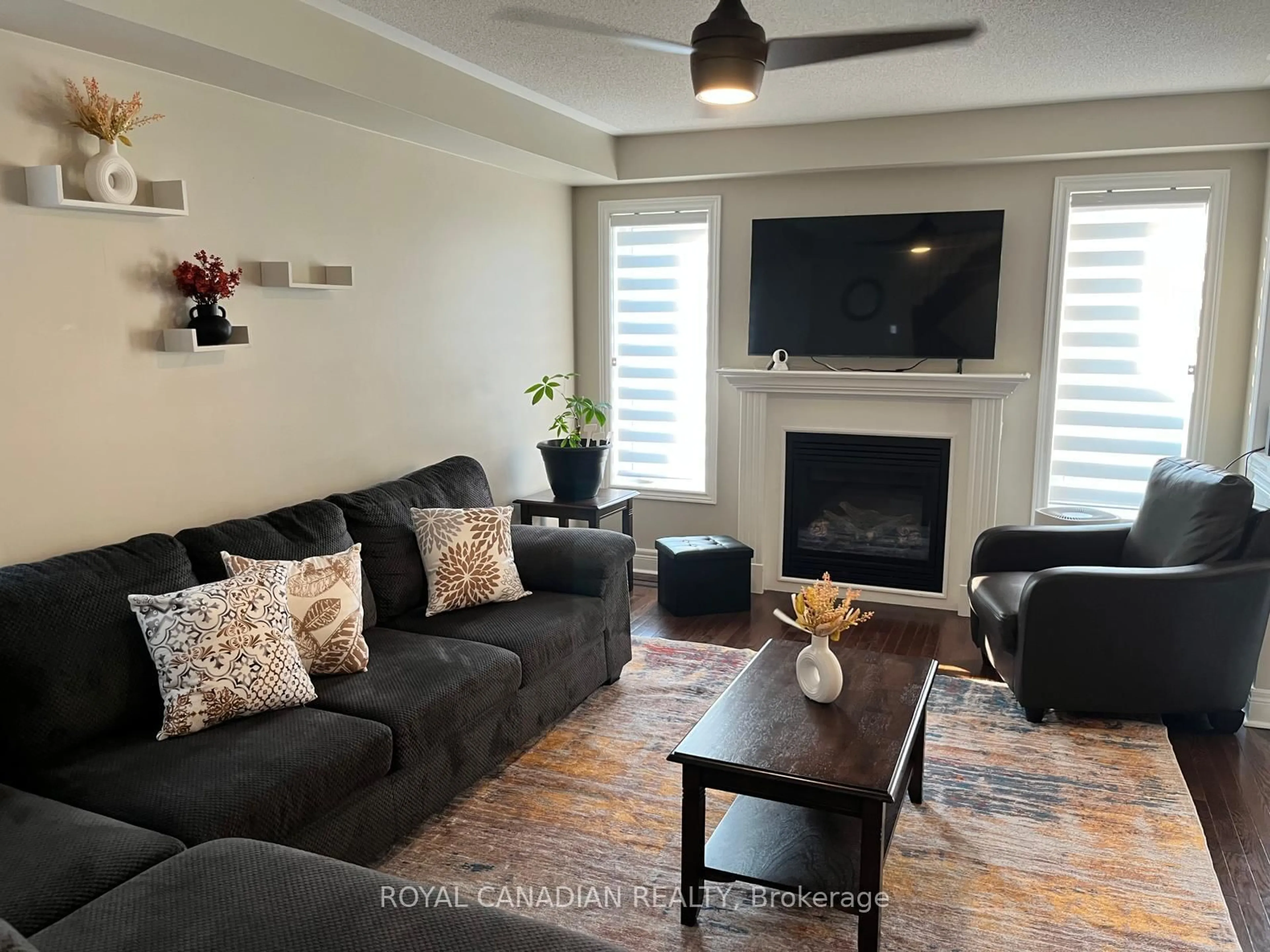 Living room with furniture, wood/laminate floor for 181 Bathgate Cres, Clarington Ontario L1E 0B6