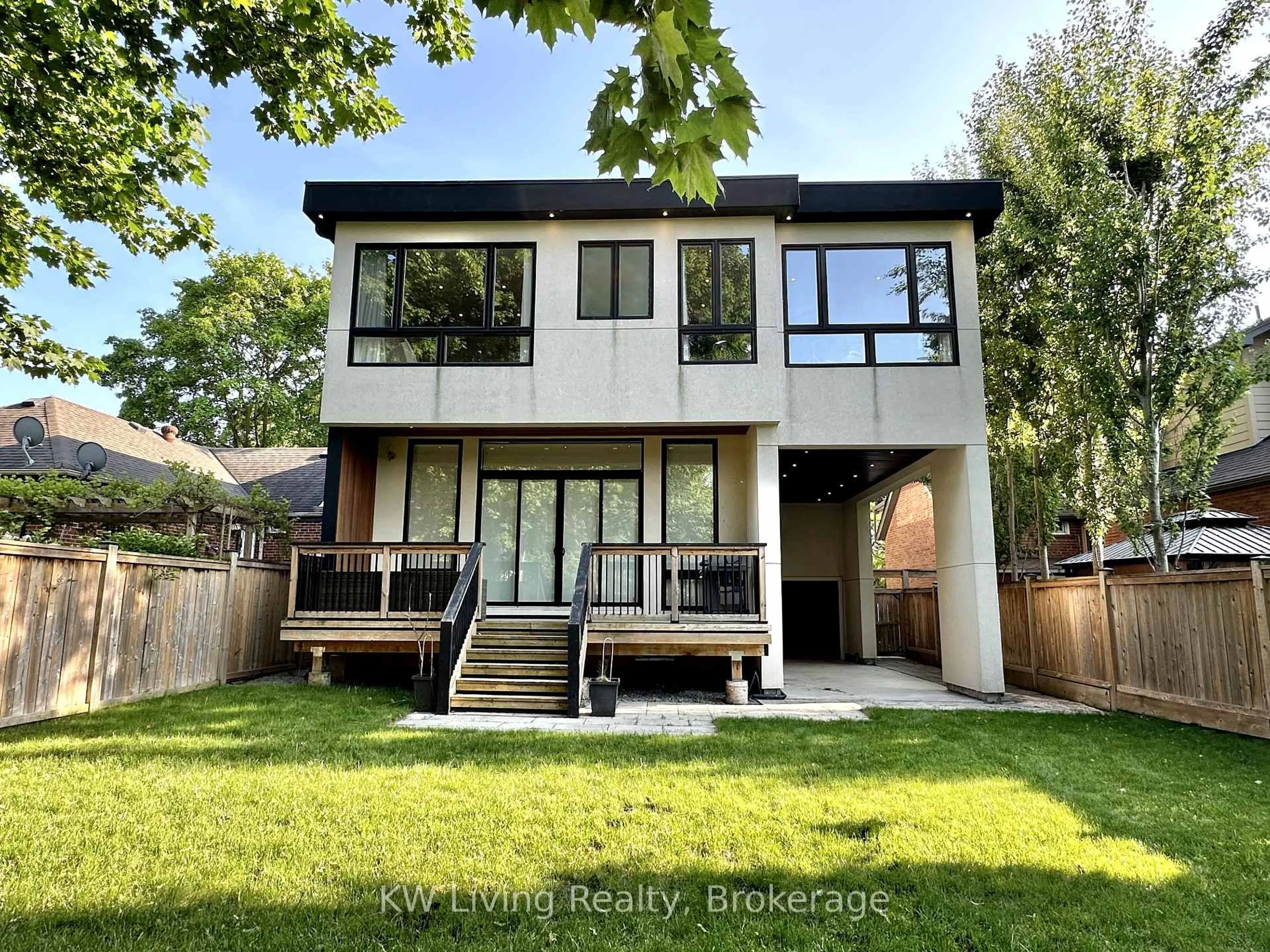 Home with brick exterior material, street for 18 Ferris Rd, Toronto Ontario M4B 1G1
