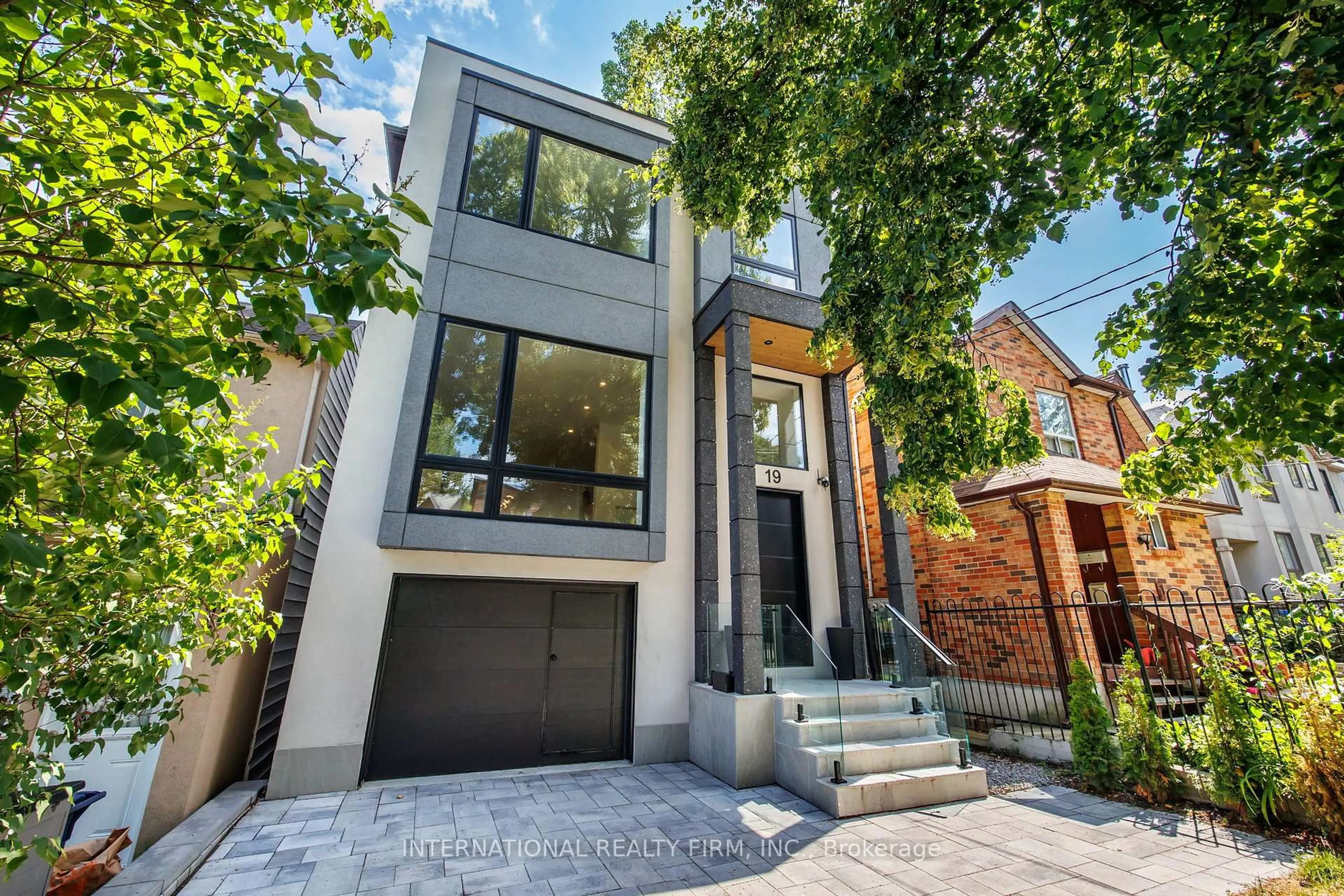 Home with brick exterior material, street for 19 Ivy Ave, Toronto Ontario M4L 2H6