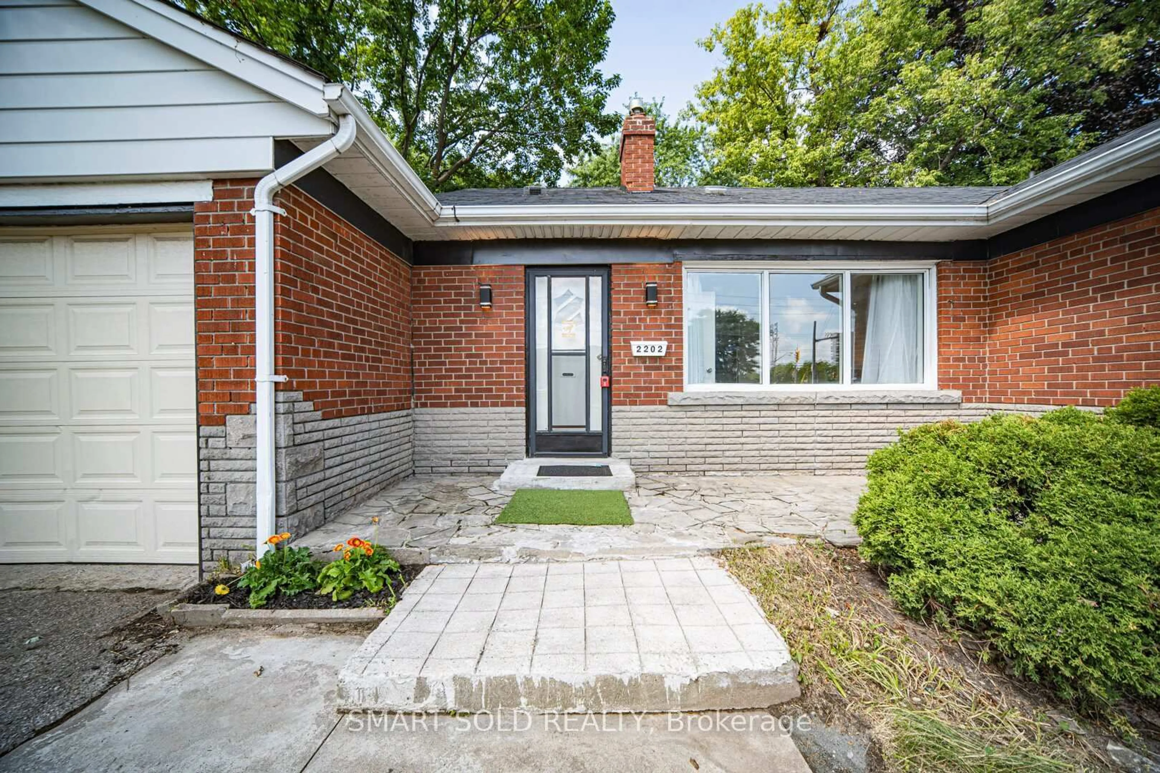 Home with brick exterior material, street for 2202 Kennedy Rd, Toronto Ontario M1T 3G4