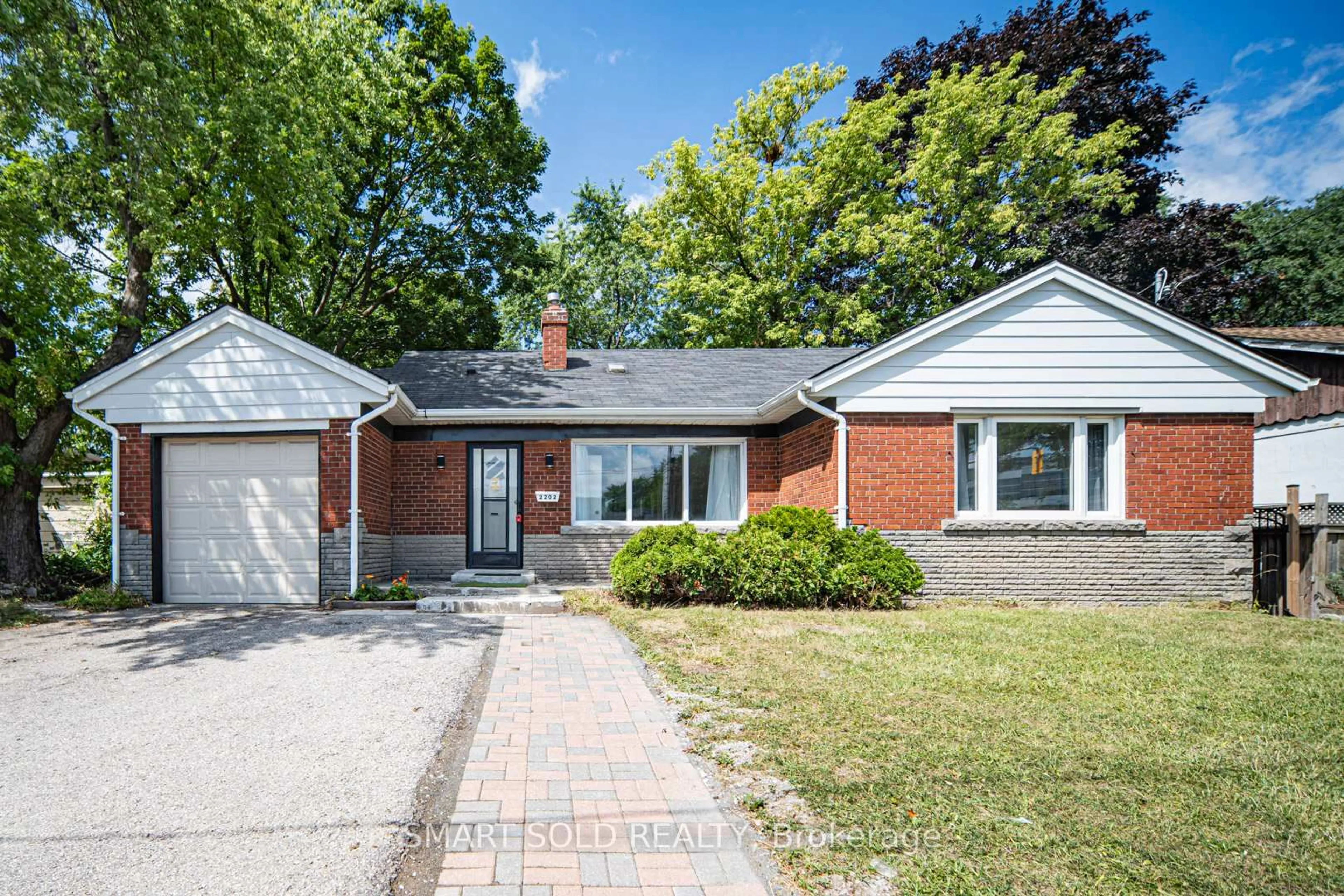 Home with brick exterior material, street for 2202 Kennedy Rd, Toronto Ontario M1T 3G4