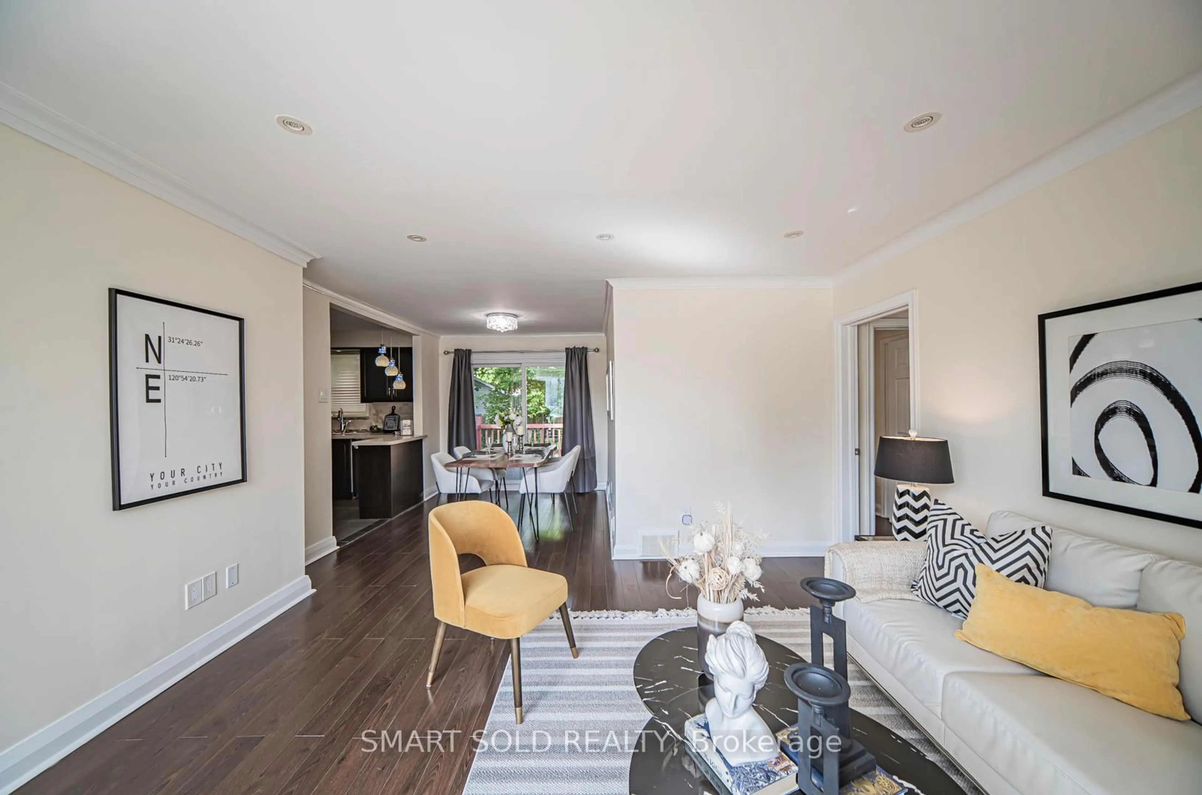 Living room with furniture, wood/laminate floor for 2202 Kennedy Rd, Toronto Ontario M1T 3G4