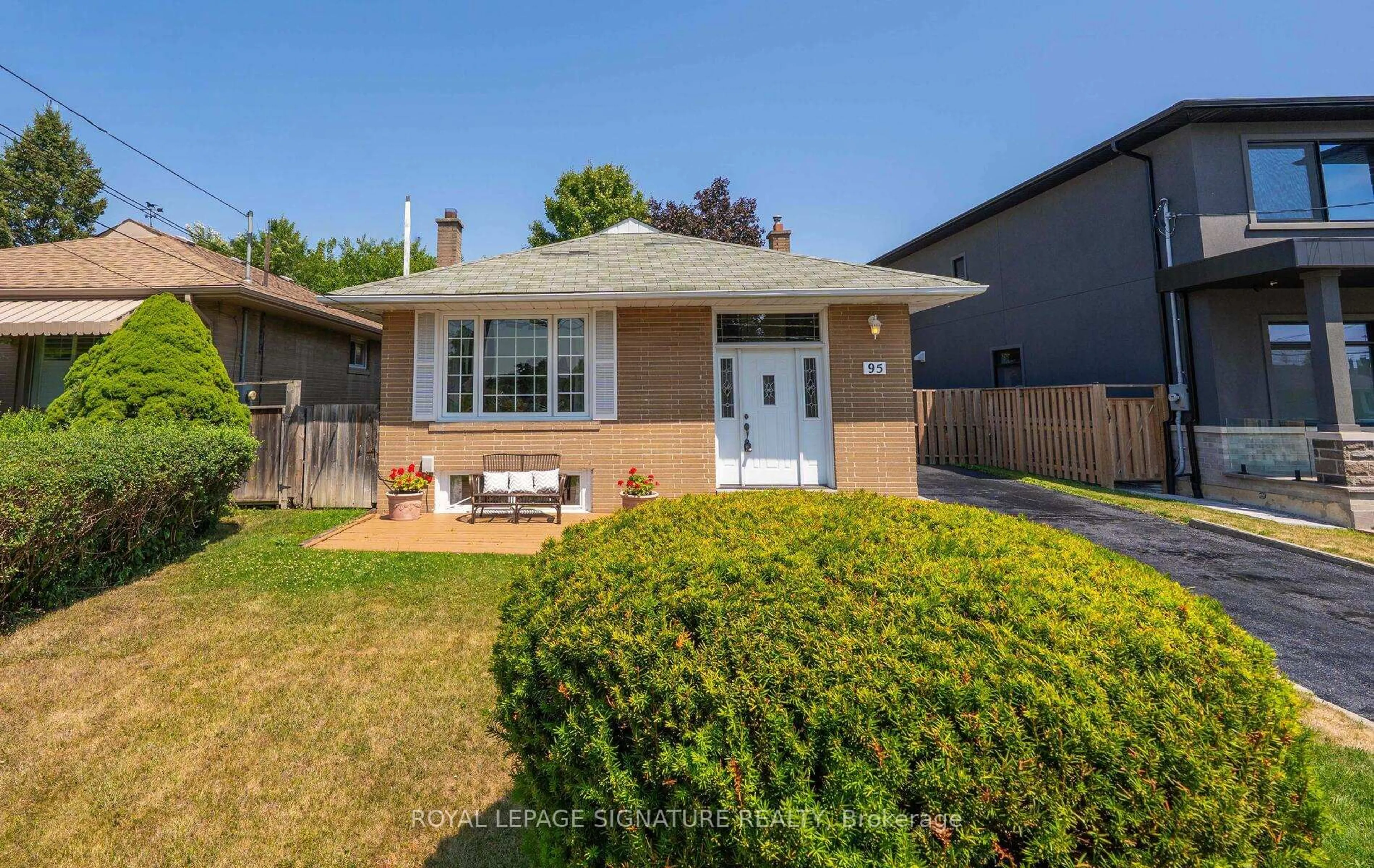 Home with brick exterior material, street for 95 Wishing Well Dr, Toronto Ontario M1T 1J2