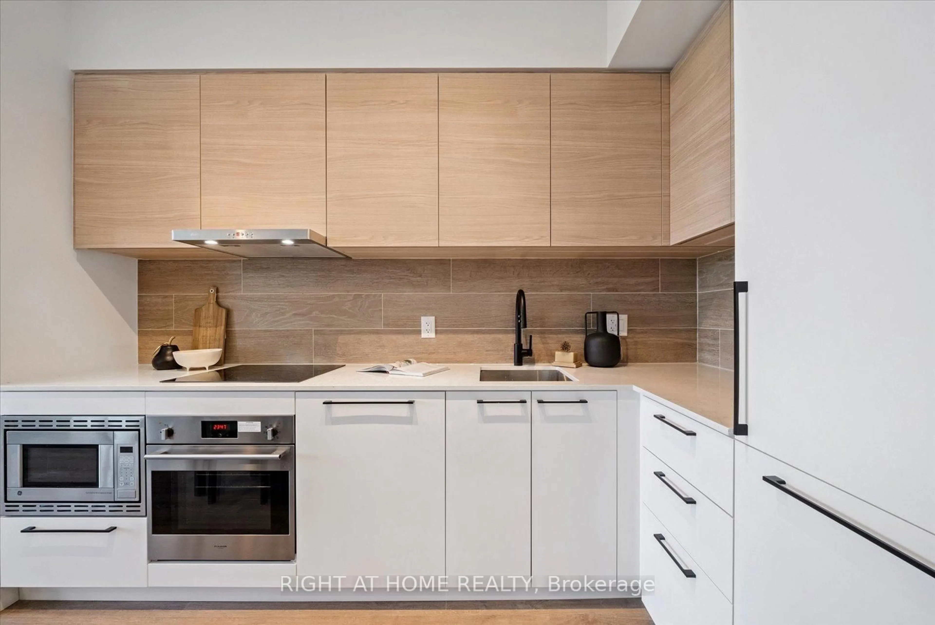 Contemporary kitchen, wood/laminate floor for 1050 Eastern Ave #613, Toronto Ontario M4L 0B7