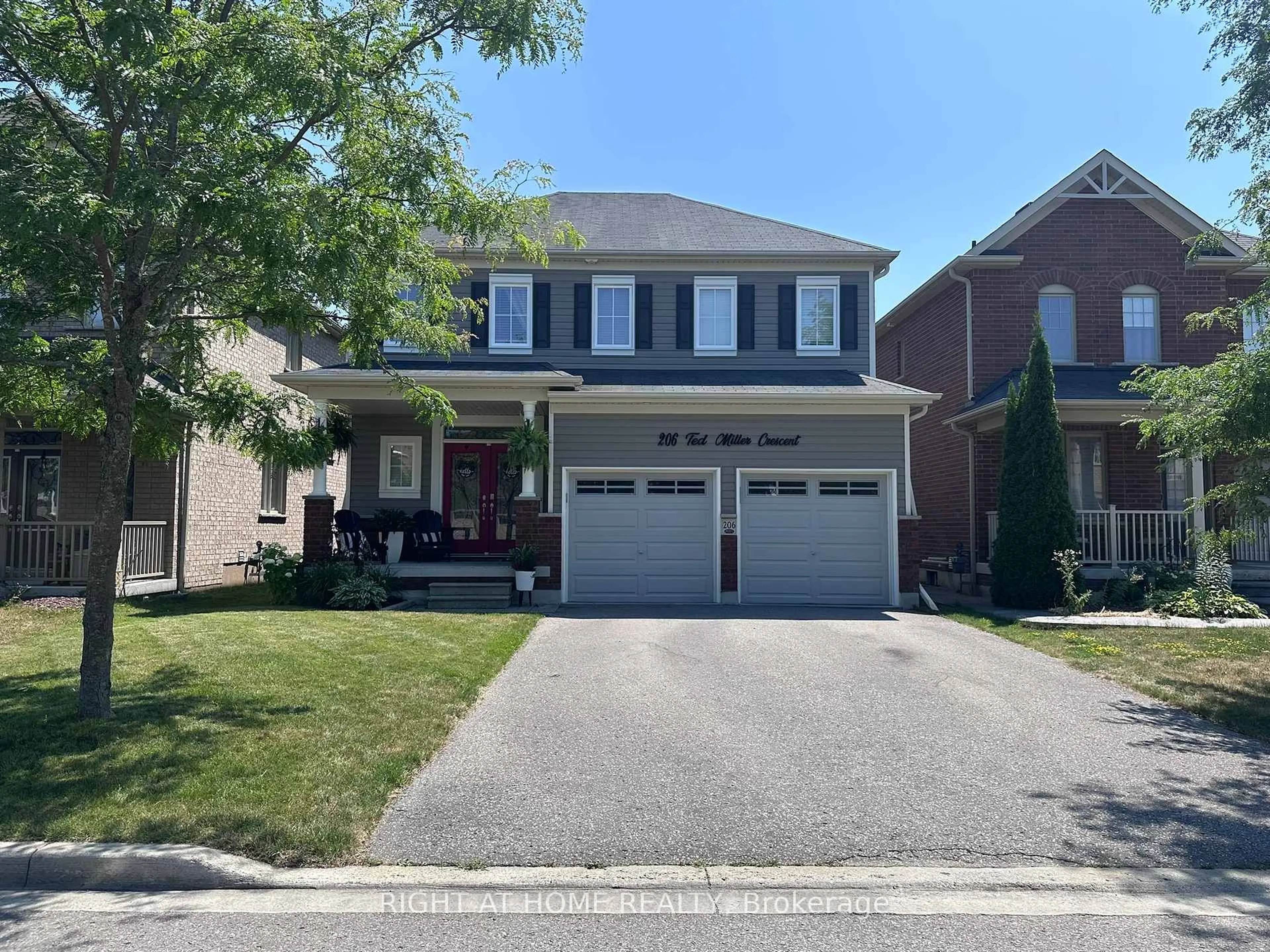 Home with brick exterior material, street for 206 Ted Miller Cres, Clarington Ontario L1C 0L6