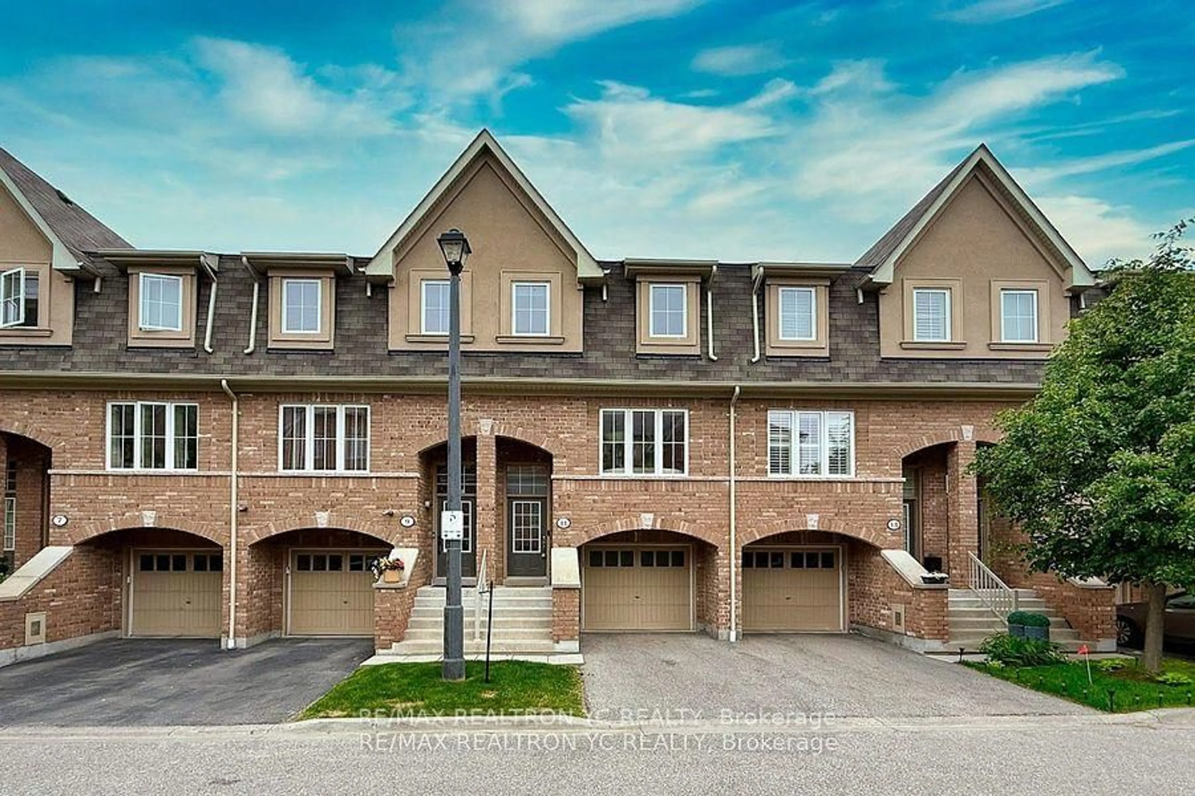 Home with brick exterior material, street for 11 Reevesmere Lane, Ajax Ontario L1Z 0L3