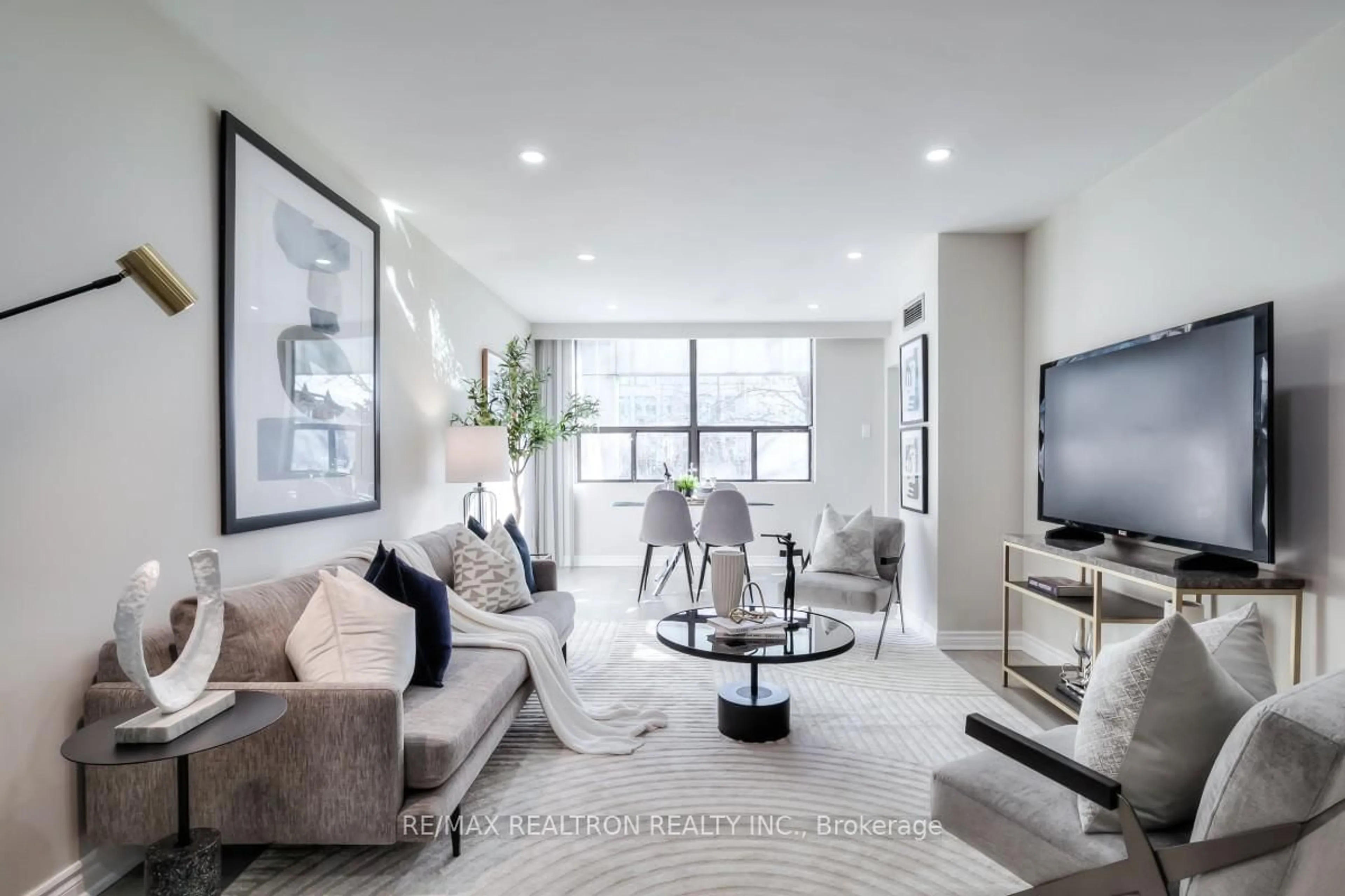 Living room with furniture, unknown for 39 Kimbercroft Crt #105, Toronto Ontario M1S 5B5