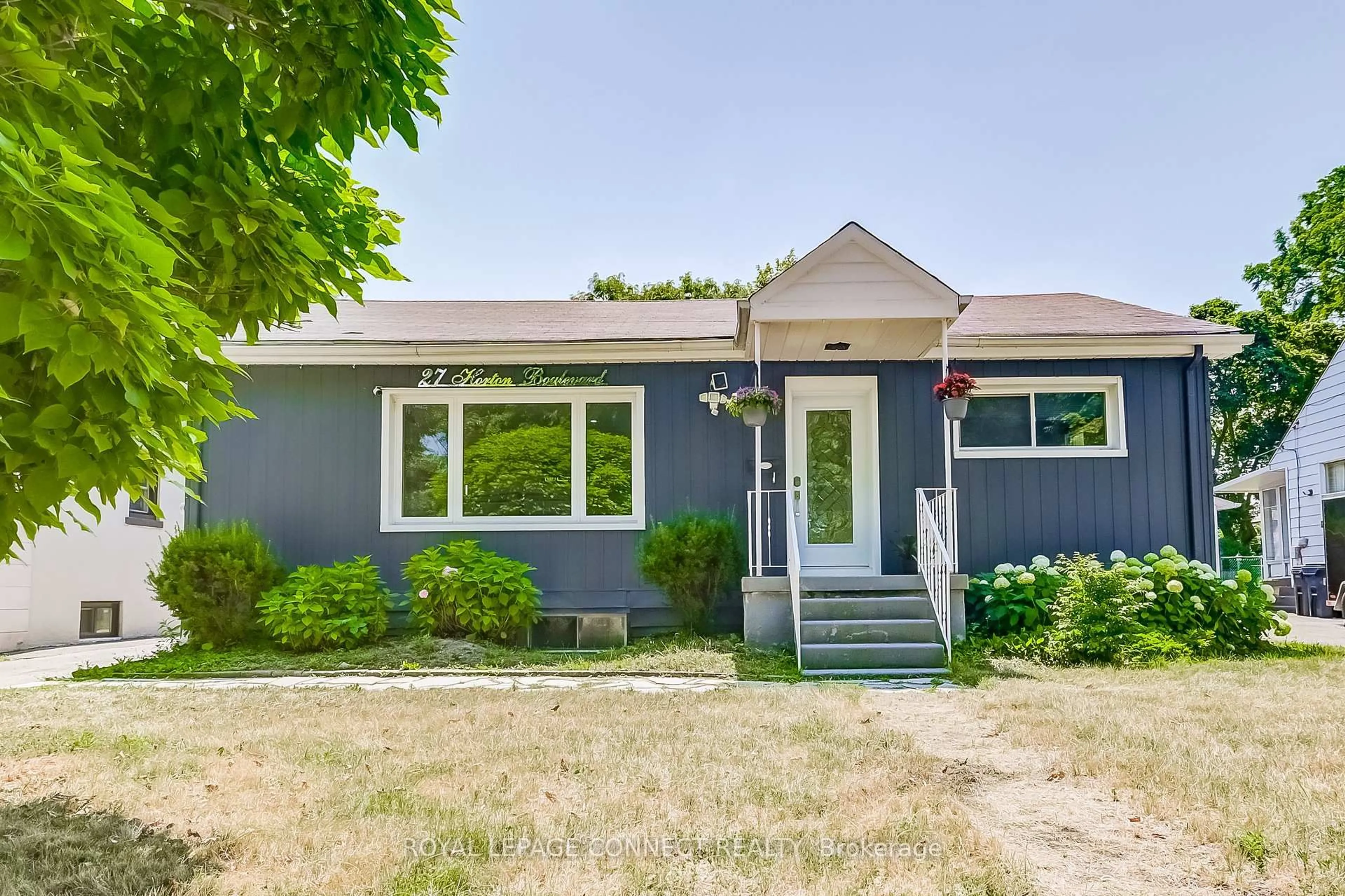Home with vinyl exterior material, street for 27 Horton Blvd, Toronto Ontario M1J 1K7