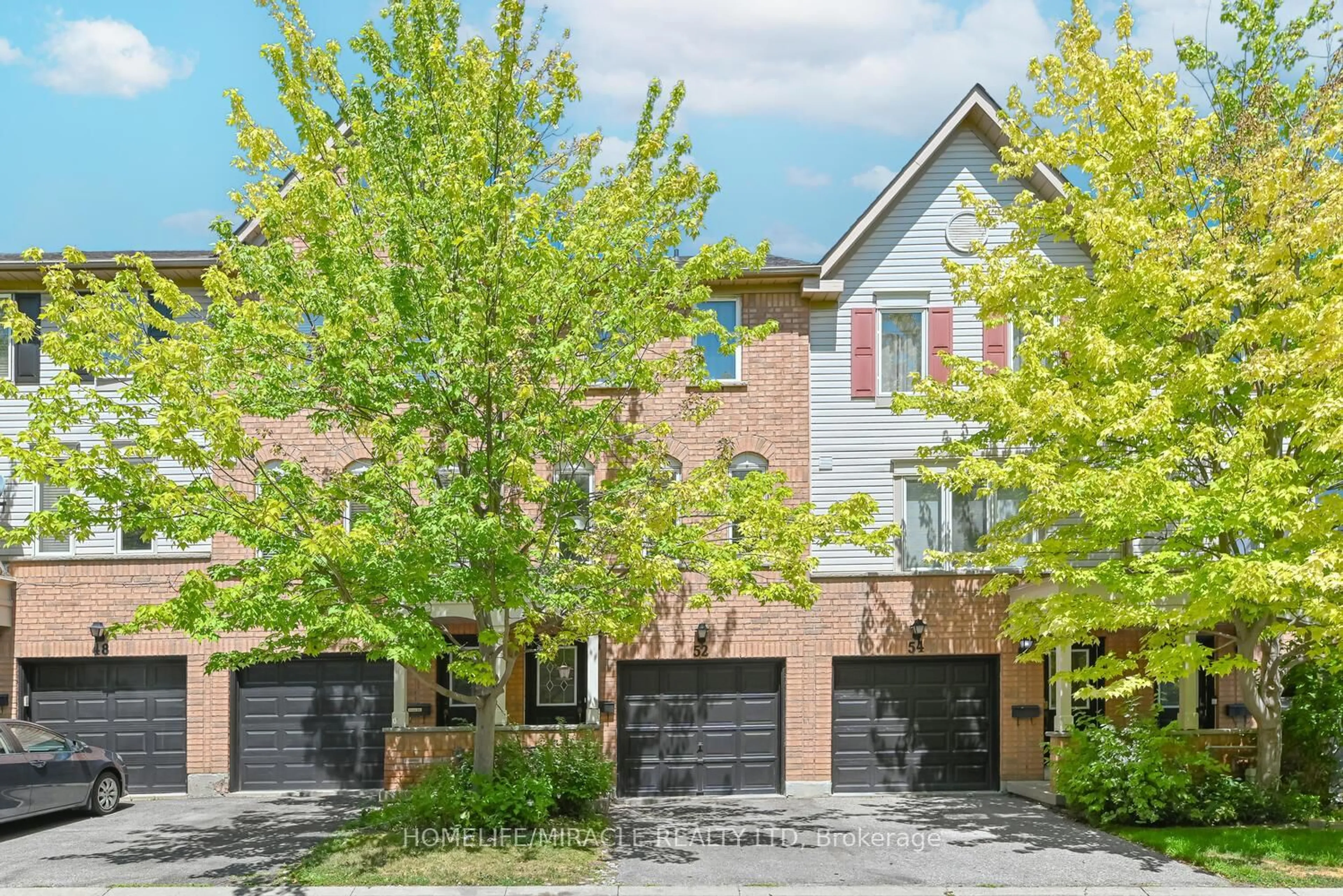 Home with brick exterior material, street for 52 McGonigal Lane, Ajax Ontario L1T 4G9