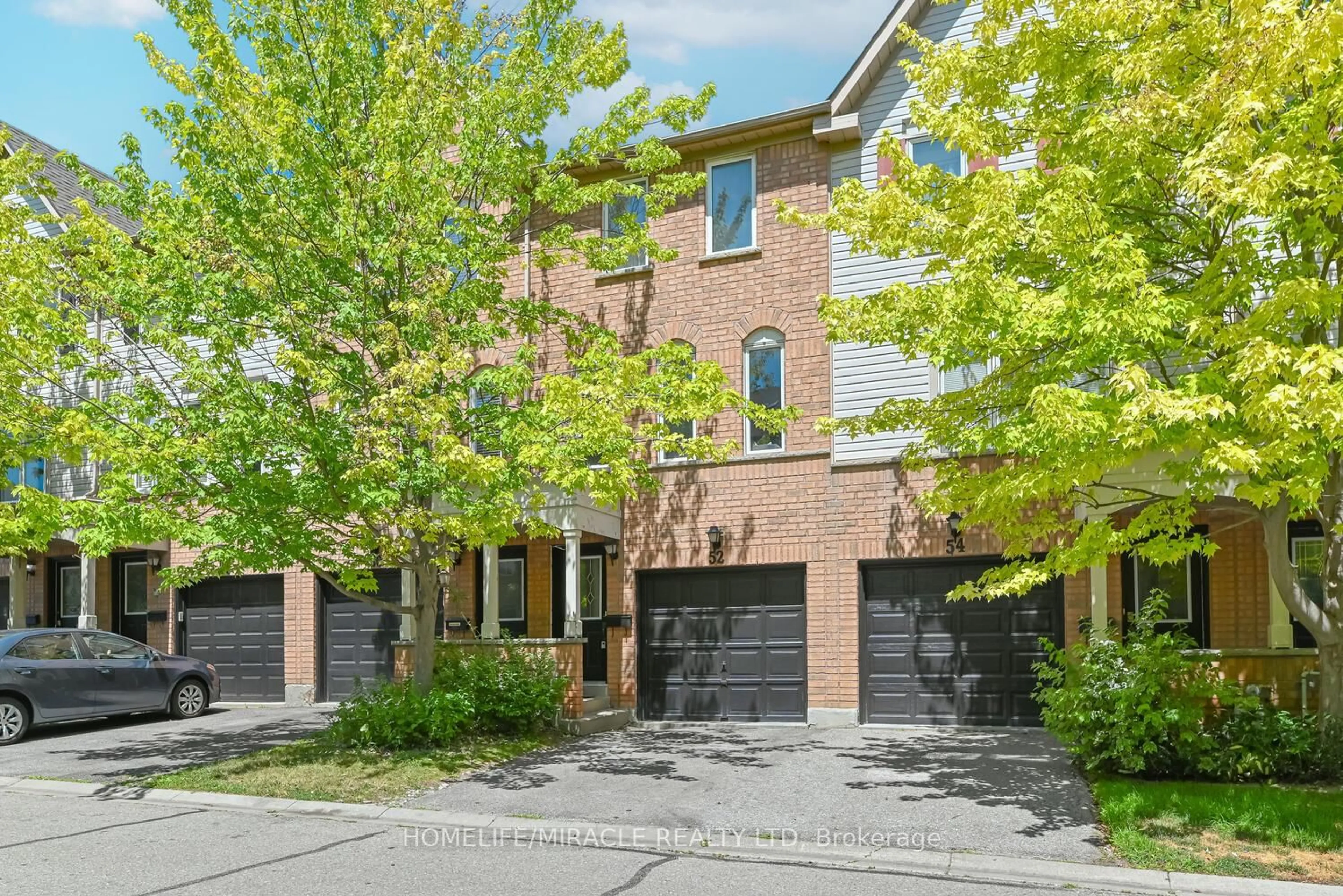 Home with brick exterior material, street for 52 McGonigal Lane, Ajax Ontario L1T 4G9