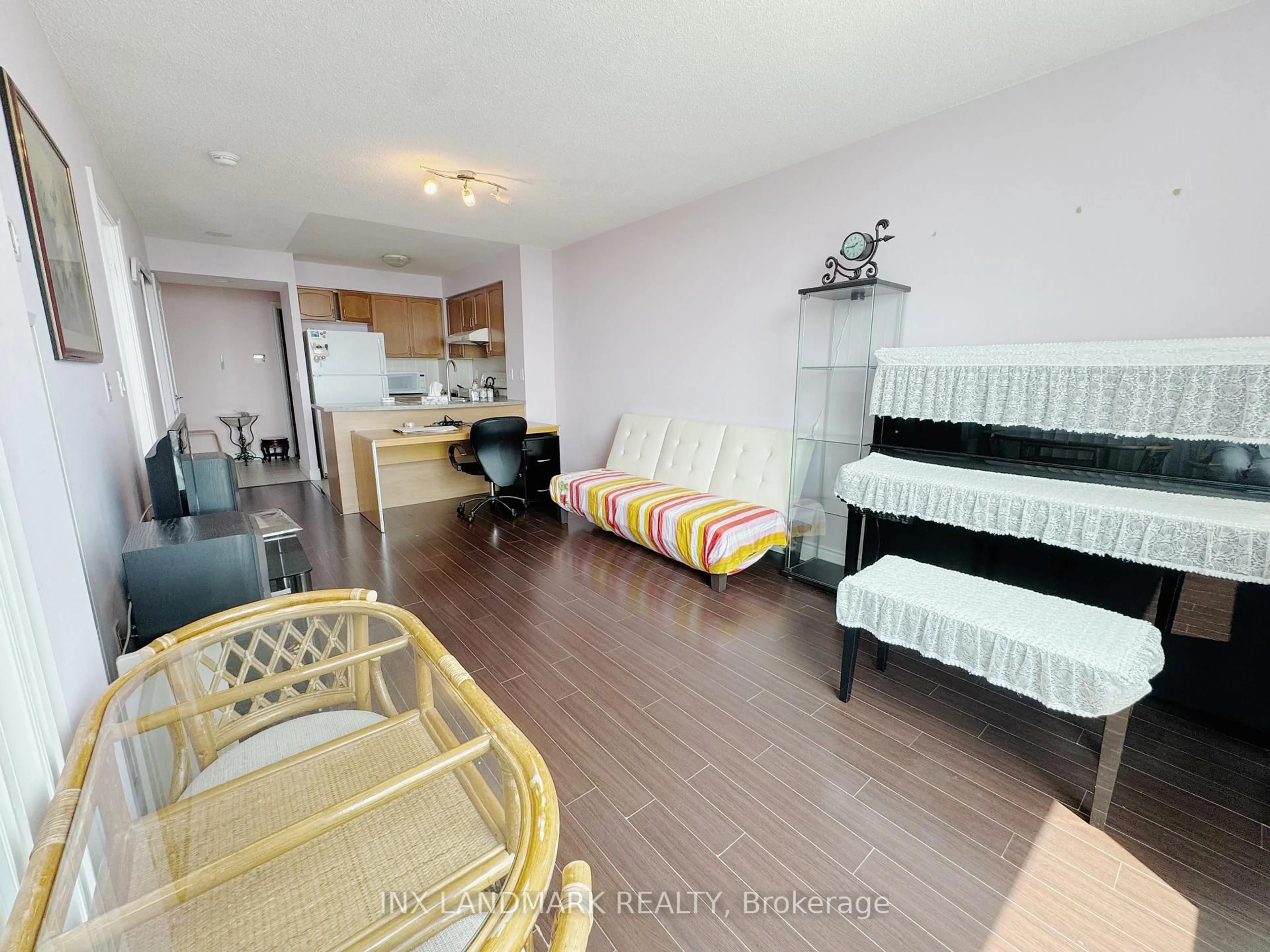 Living room with furniture, wood/laminate floor for 50 Brian Harrison Way #2301, Toronto Ontario M1P 5J4
