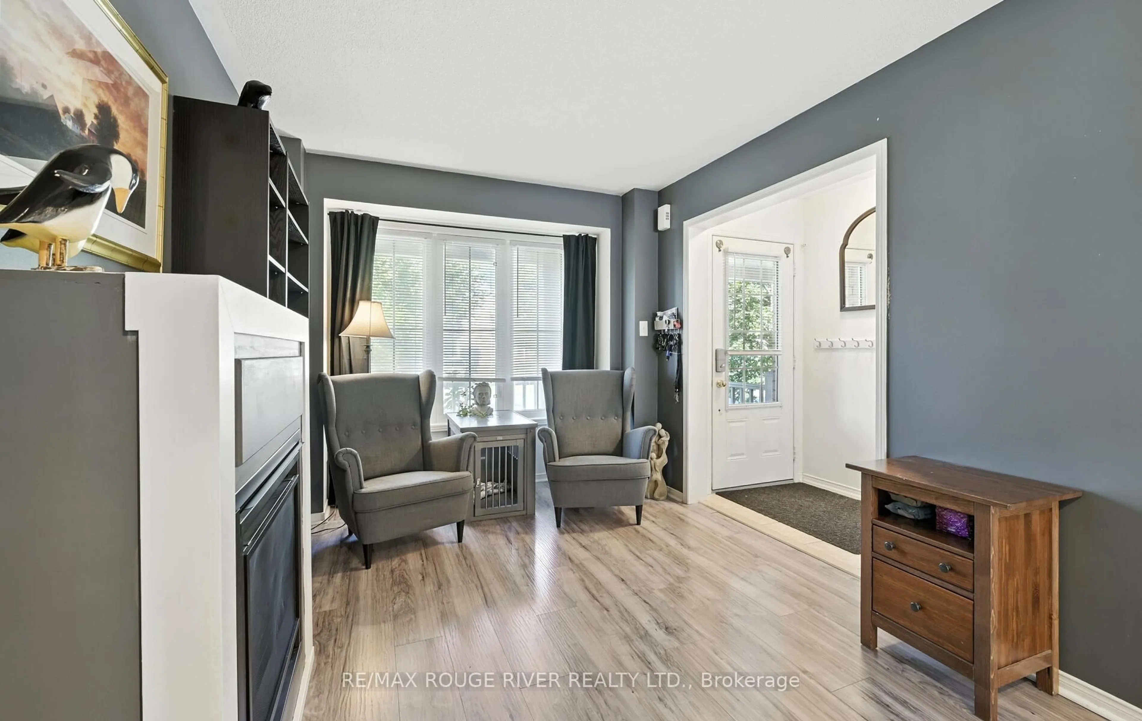 Living room with furniture, wood/laminate floor for 2261 Winlord Pl, Oshawa Ontario L1L 0B7