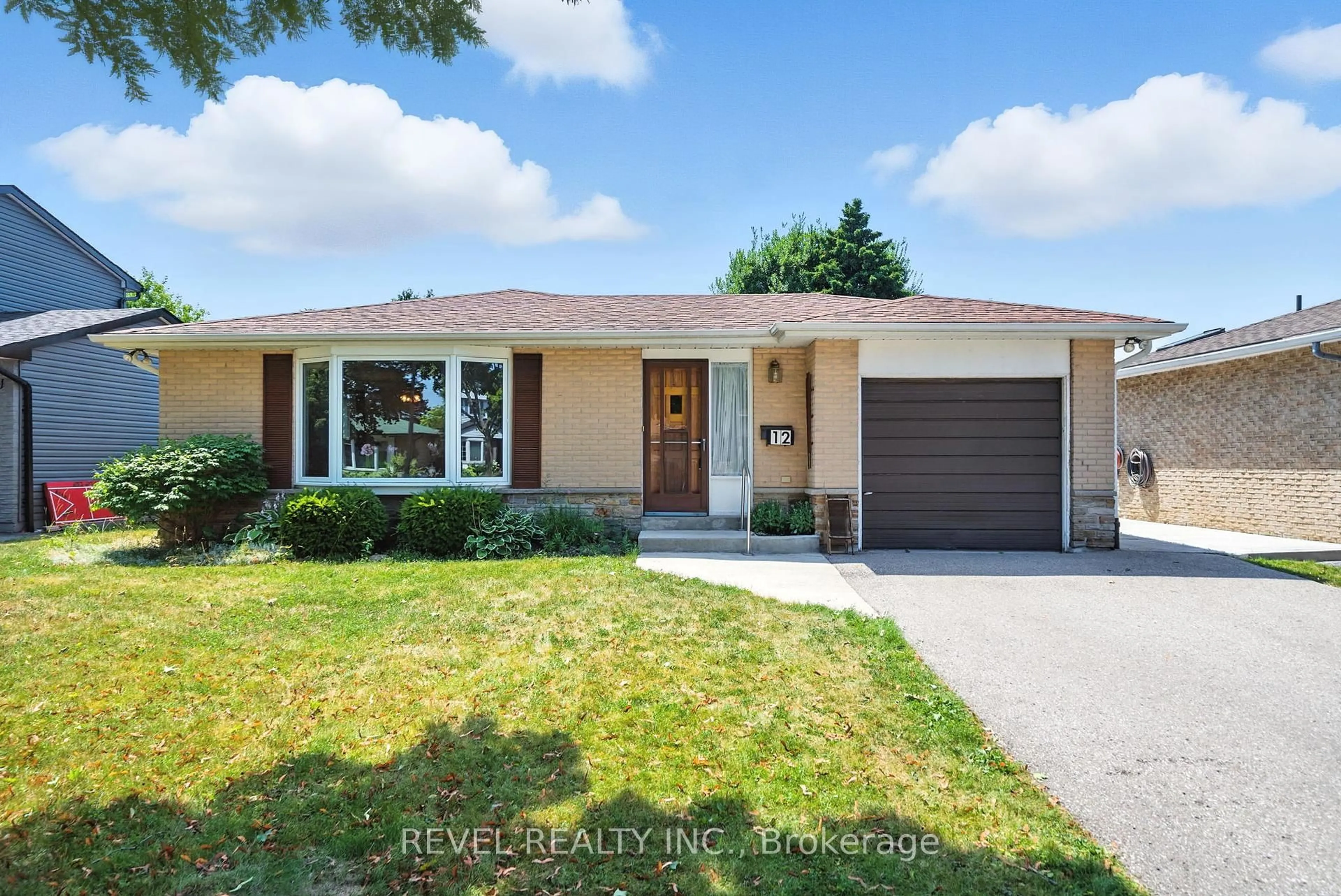 Home with brick exterior material, street for 12 Swanston Cres, Ajax Ontario L1S 3J6