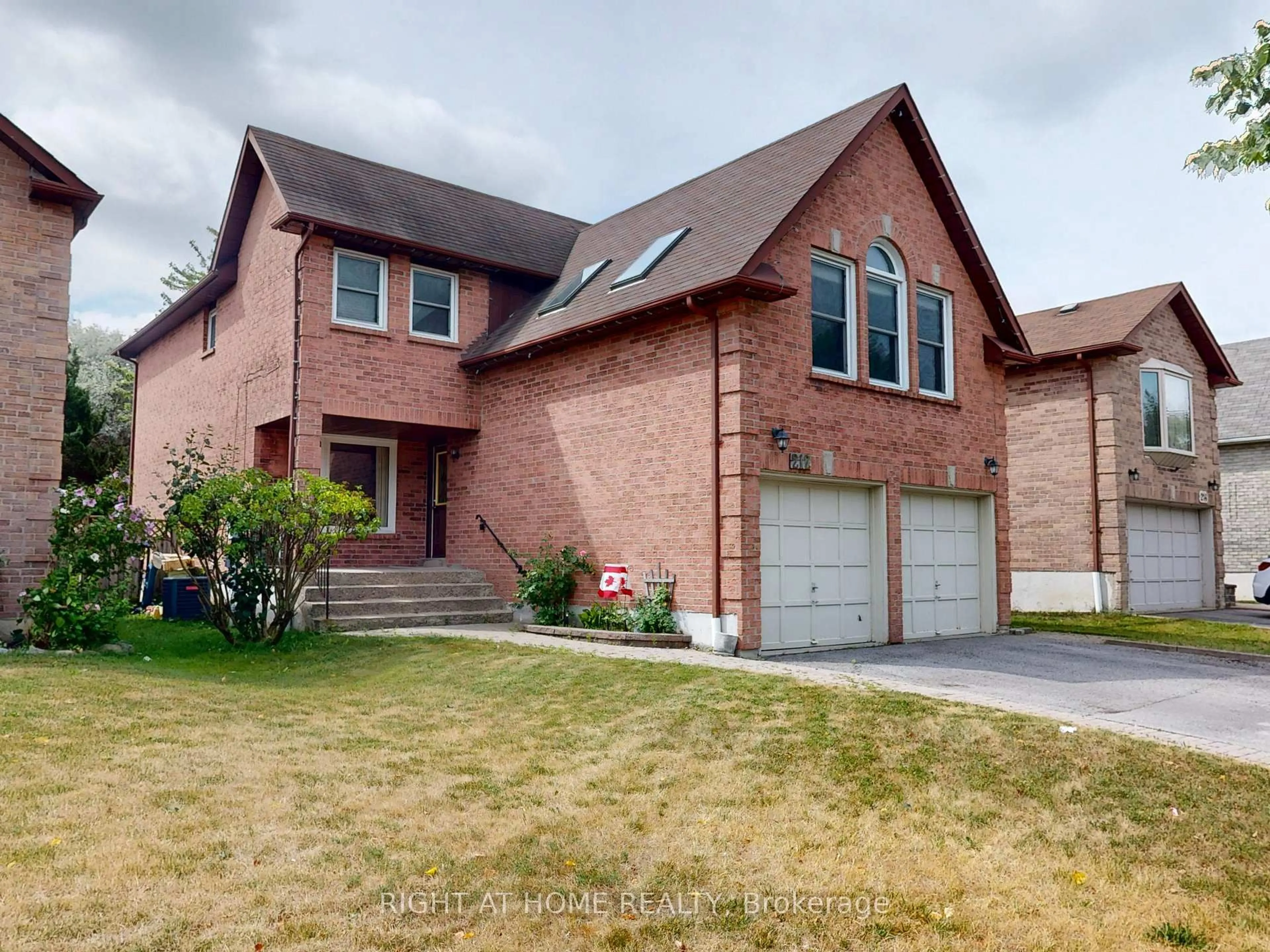 Home with brick exterior material, street for 212 Delaney Dr, Ajax Ontario L1T 2B4