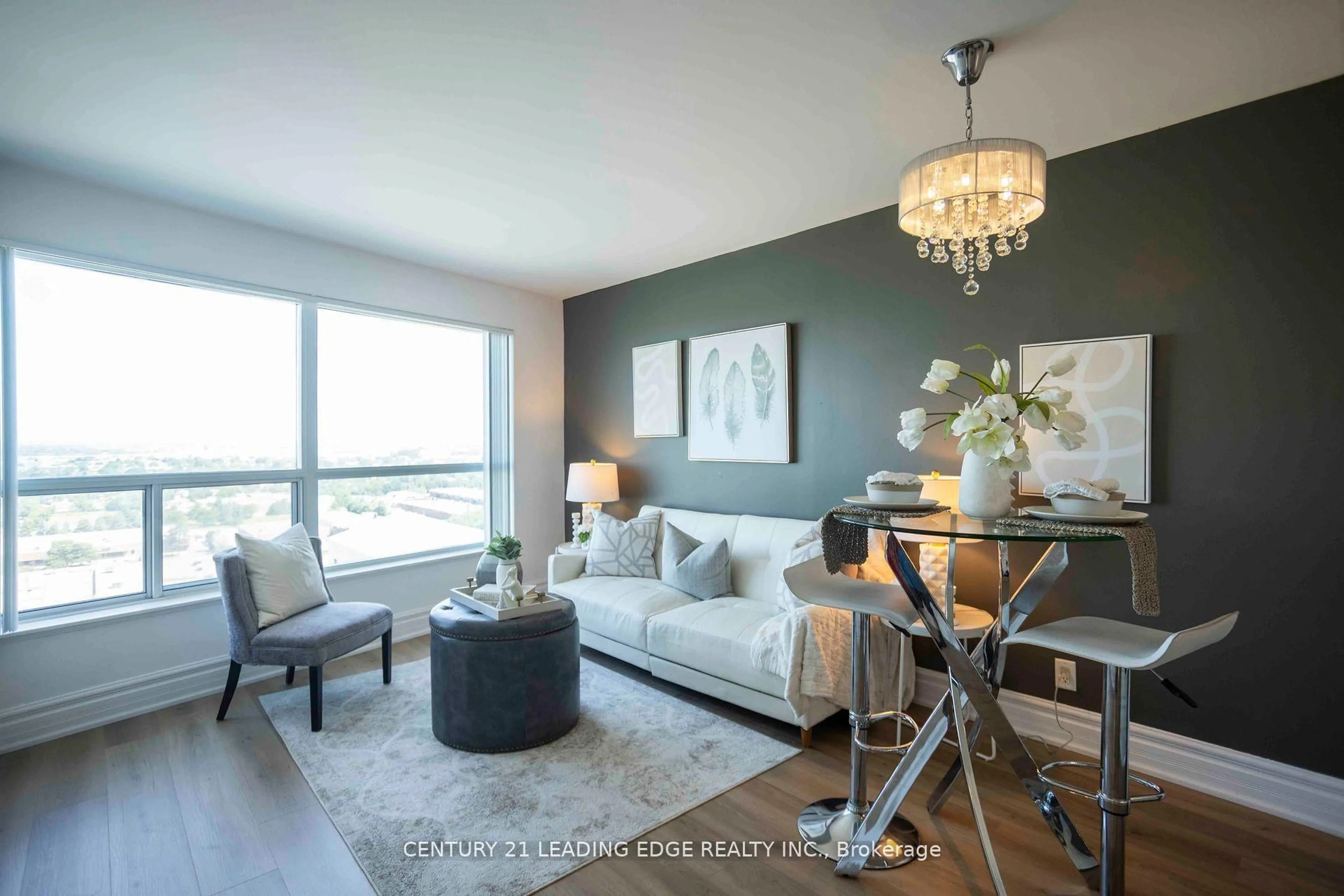 Living room with furniture, wood/laminate floor for 38 Lee Centre Dr #2112, Toronto Ontario M1H 3J7